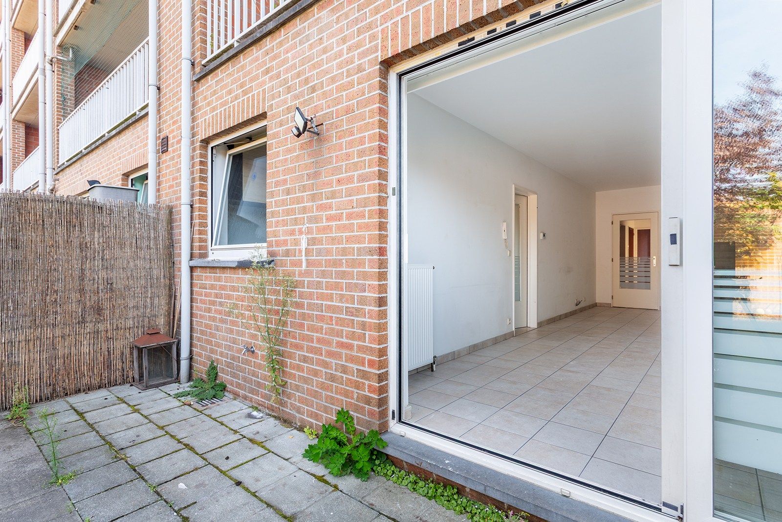Mooi gelijkvloers appartement met tuin foto 9