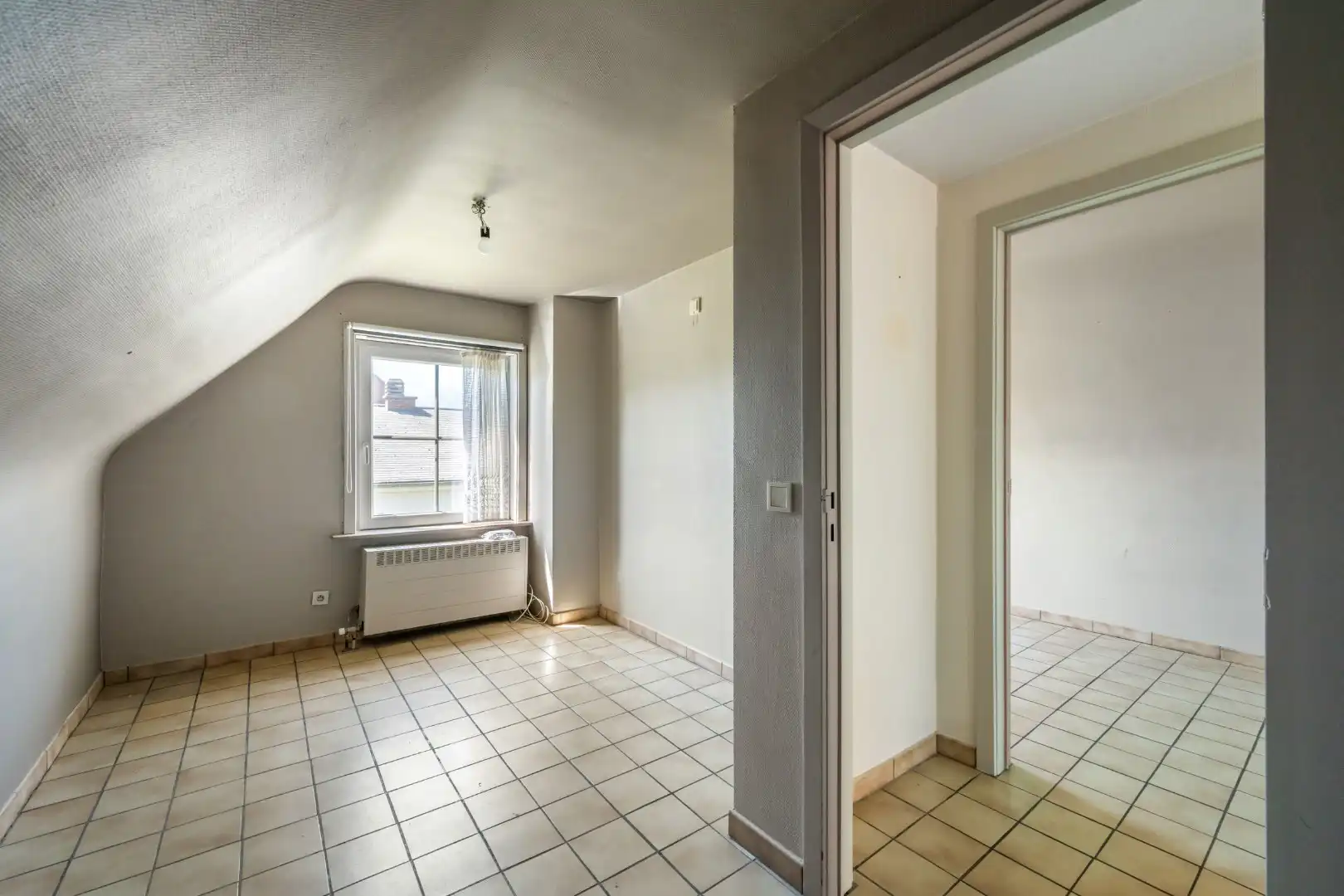 Instapklare open woning met 3 slaapkamers, garage, carport en tuin in Roeselare foto 16