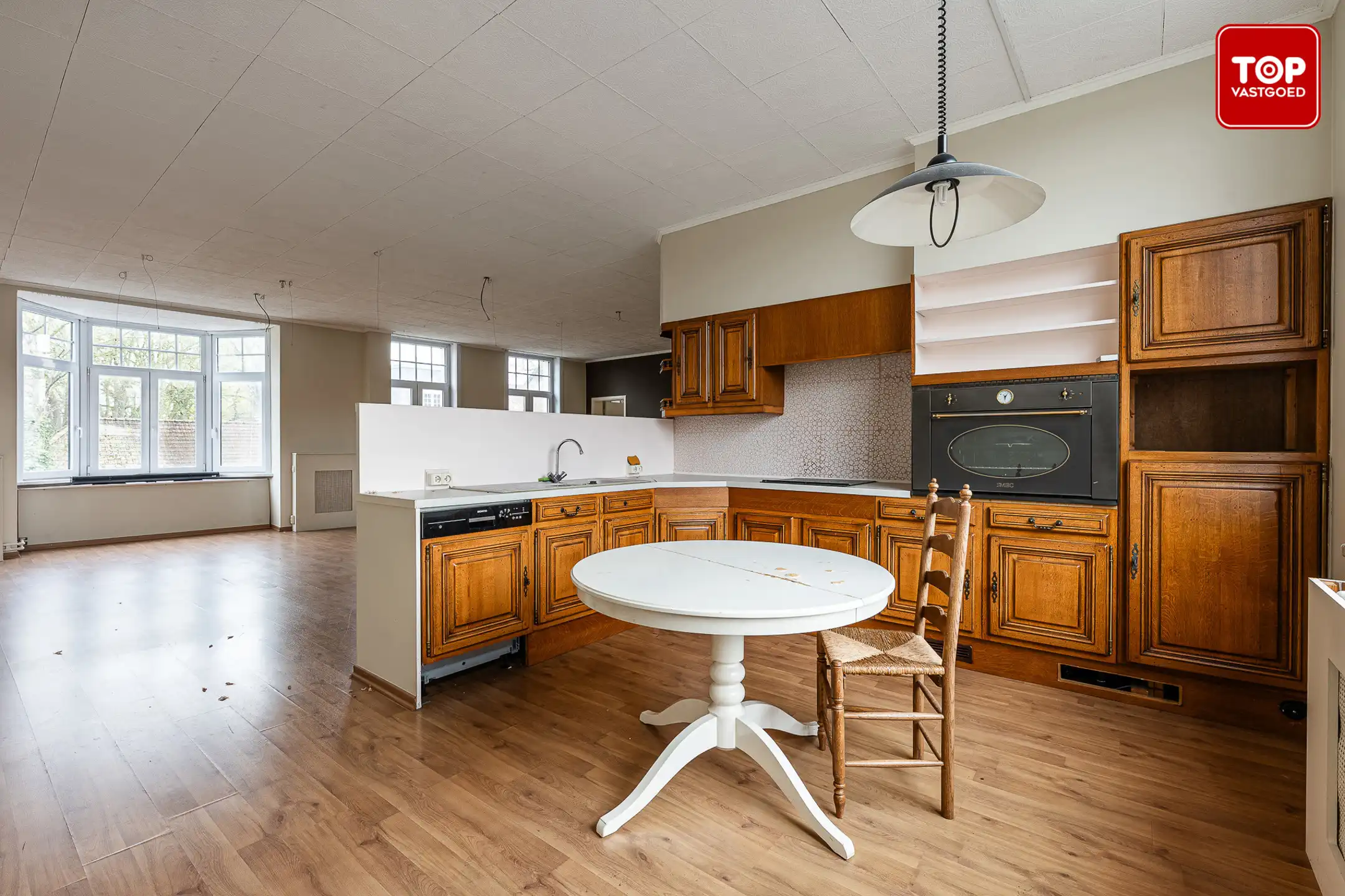 Karaktervol en  multifunctioneel handelshuis  op een interessante ligging.  foto 18