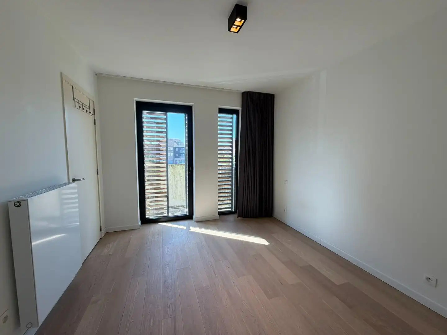 Energiezuinig appartement met 1 slaapkamer en terras + parkeerplaats foto 8