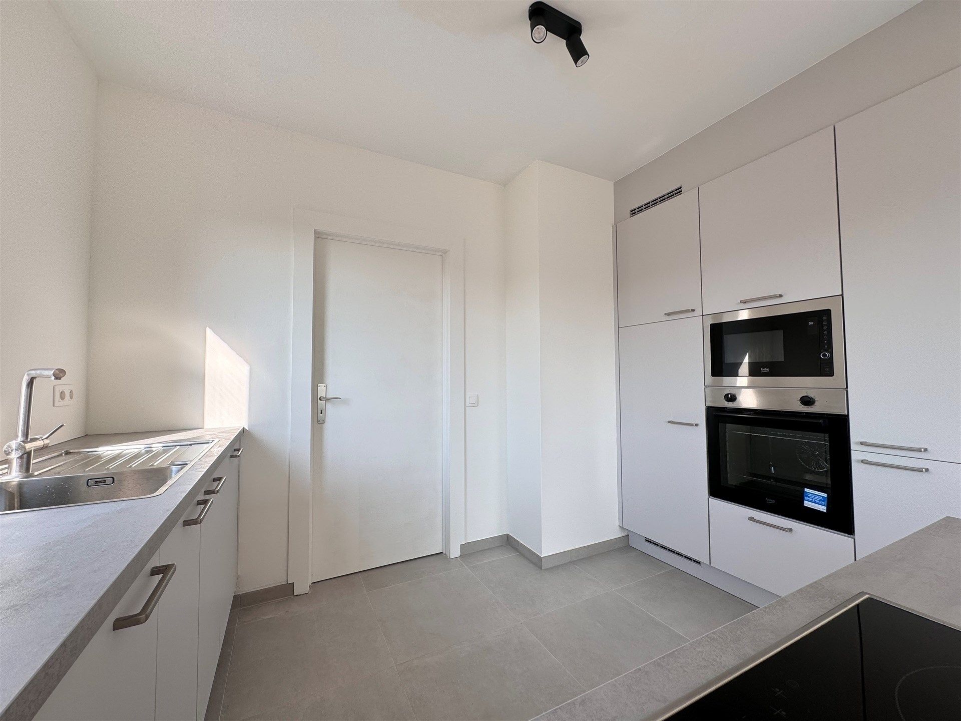 Zeer interessant gelegen appartement met tuin en garage op eerste verdieping. foto 10
