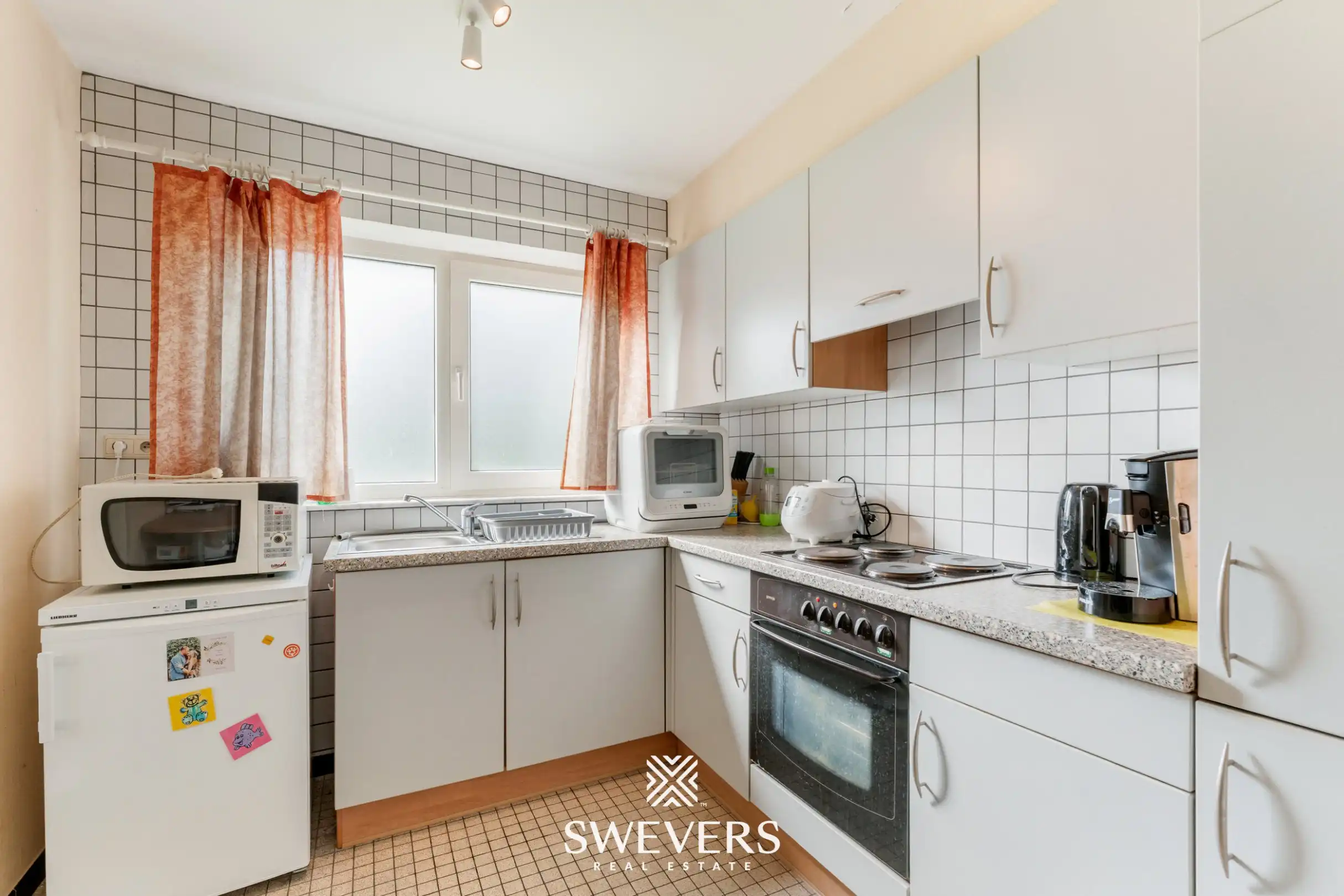 Ruim gelijkvloers 3-slaapkamerappartement inclusief autostaanplaats en kelderberging nabij Hasselt-centrum foto 13