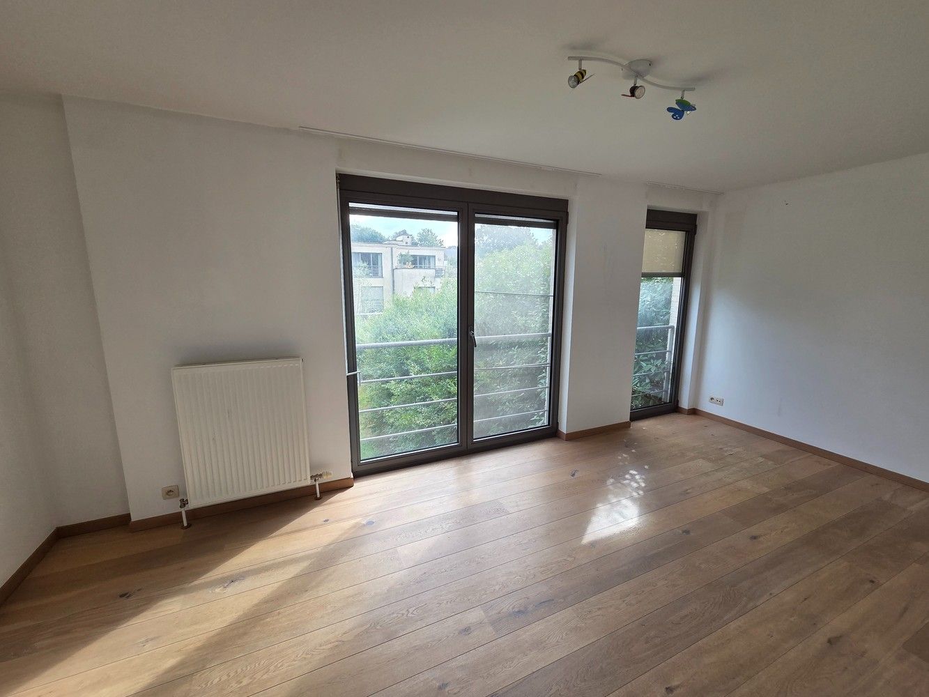 Clusterwoning met 4 ruime slaapkamers, tuin en 2 ondergrondse staanplaatsen. foto 11