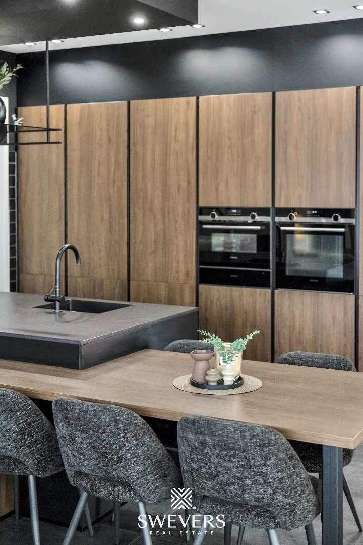 Stijlvol wonen op een ruim perceel met 4 slaapkamers en topafwerking foto 19