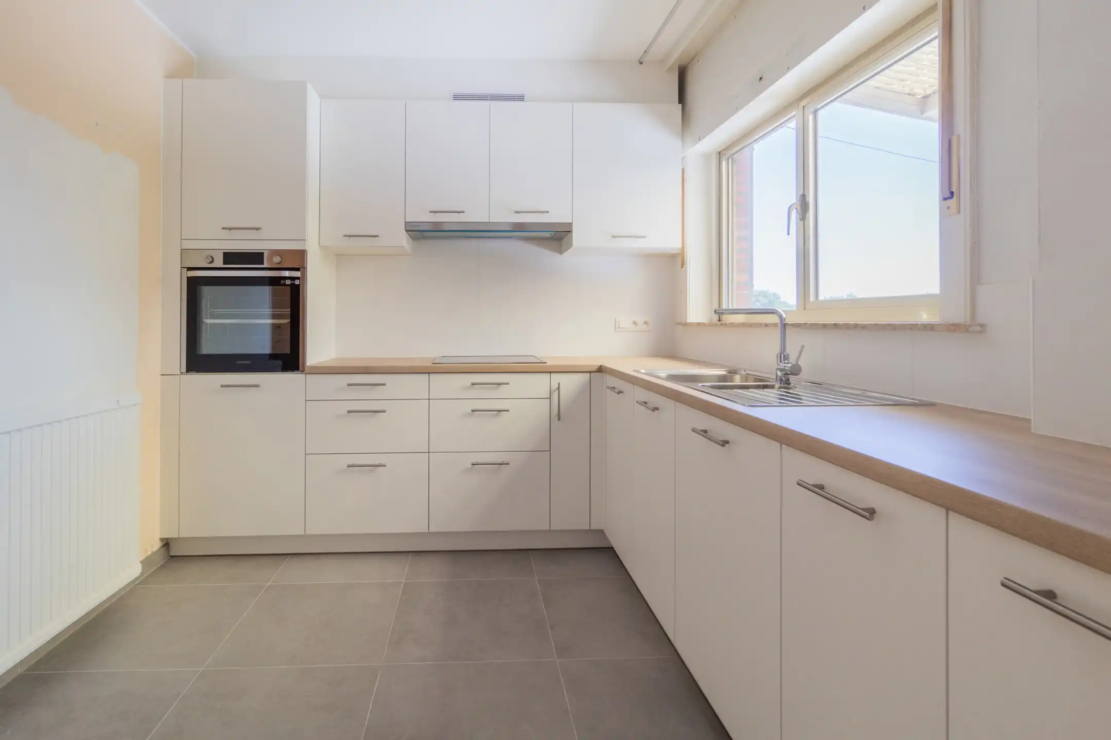 KORTENBERG- zeer ruime driegevel-woning op perceel van 11a foto 6