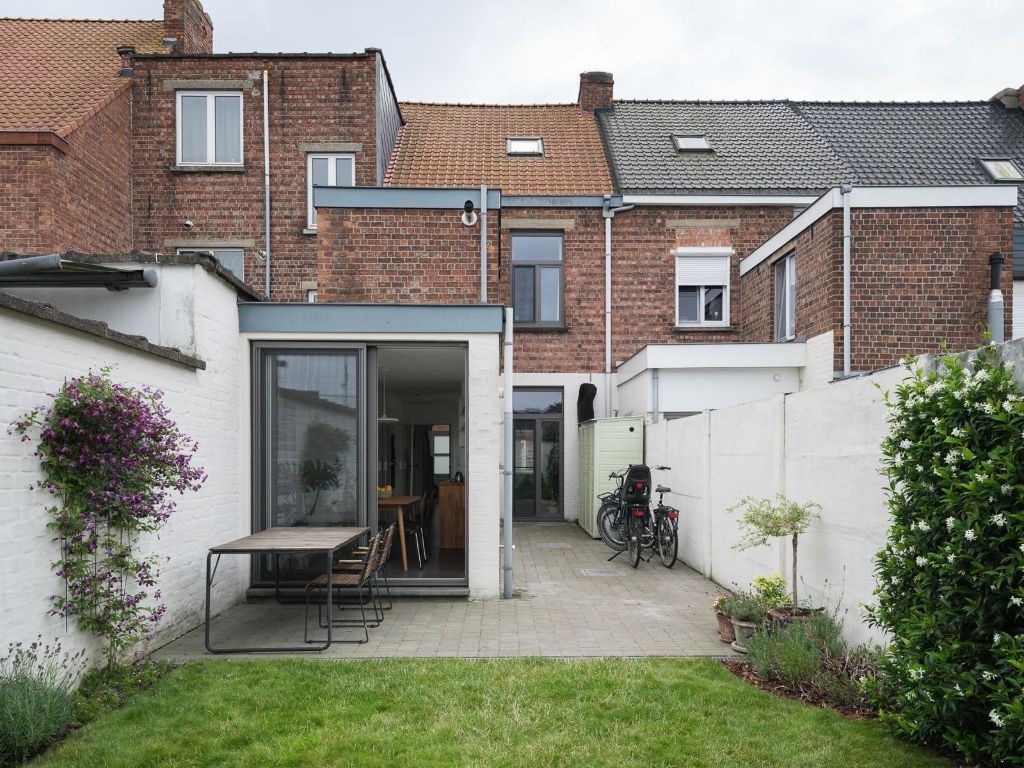 Instapklare en energiezuinige woning met 3 slaapkamers en aangename tuin, gelegen in een opkomende buurt aan de Muide. foto 21