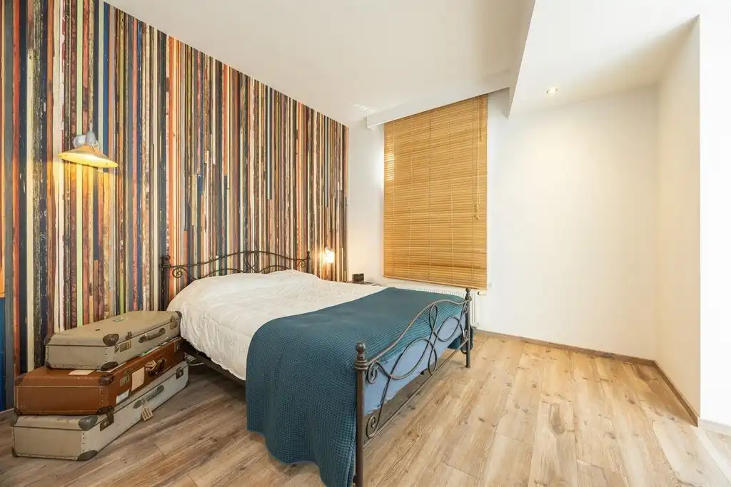 Unieke woning met eclectische gevels en dakterras foto 16