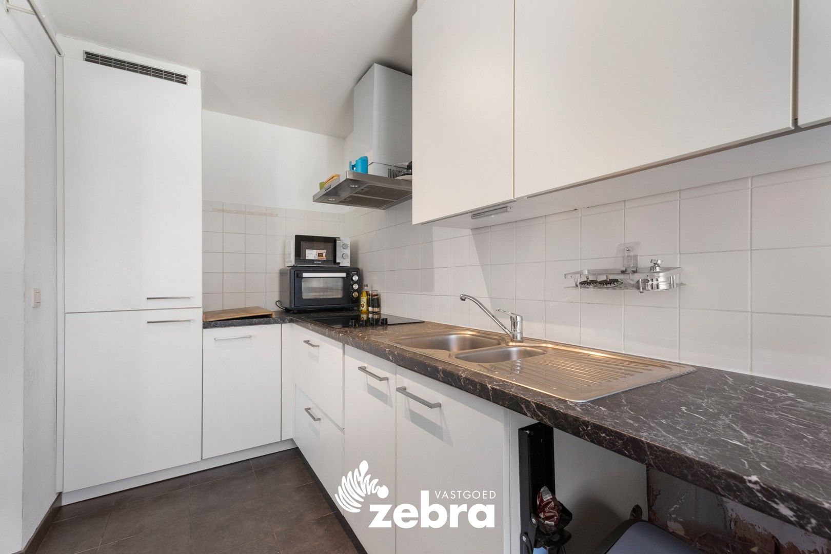 Instapklaar één-slaapkamerappartement in hartje Roeselare! foto 6