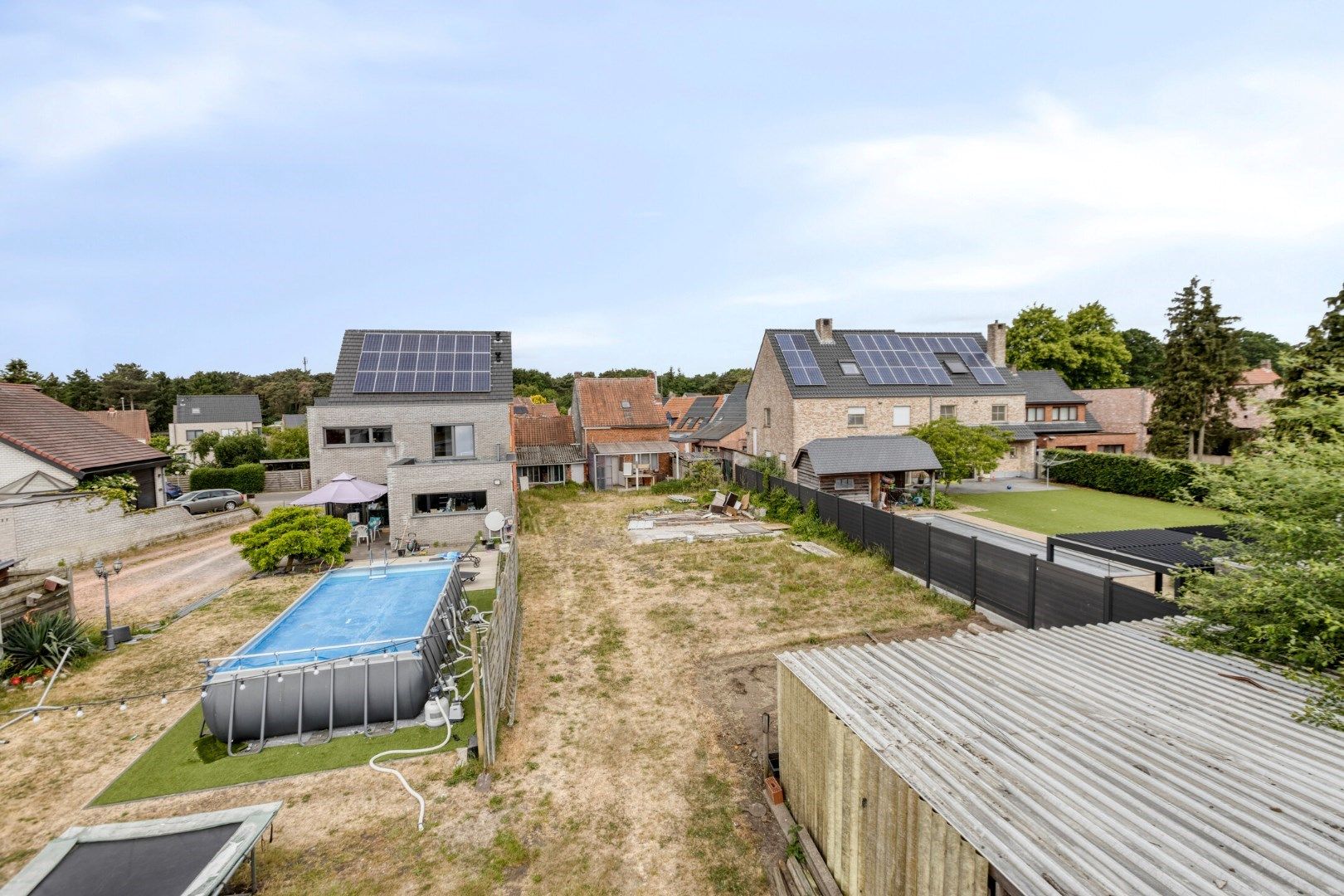 Bouwgrond van 674 m² met af te breken woning in een doodlopende straat te Ginderbuiten ! foto {{pictureIndex}}