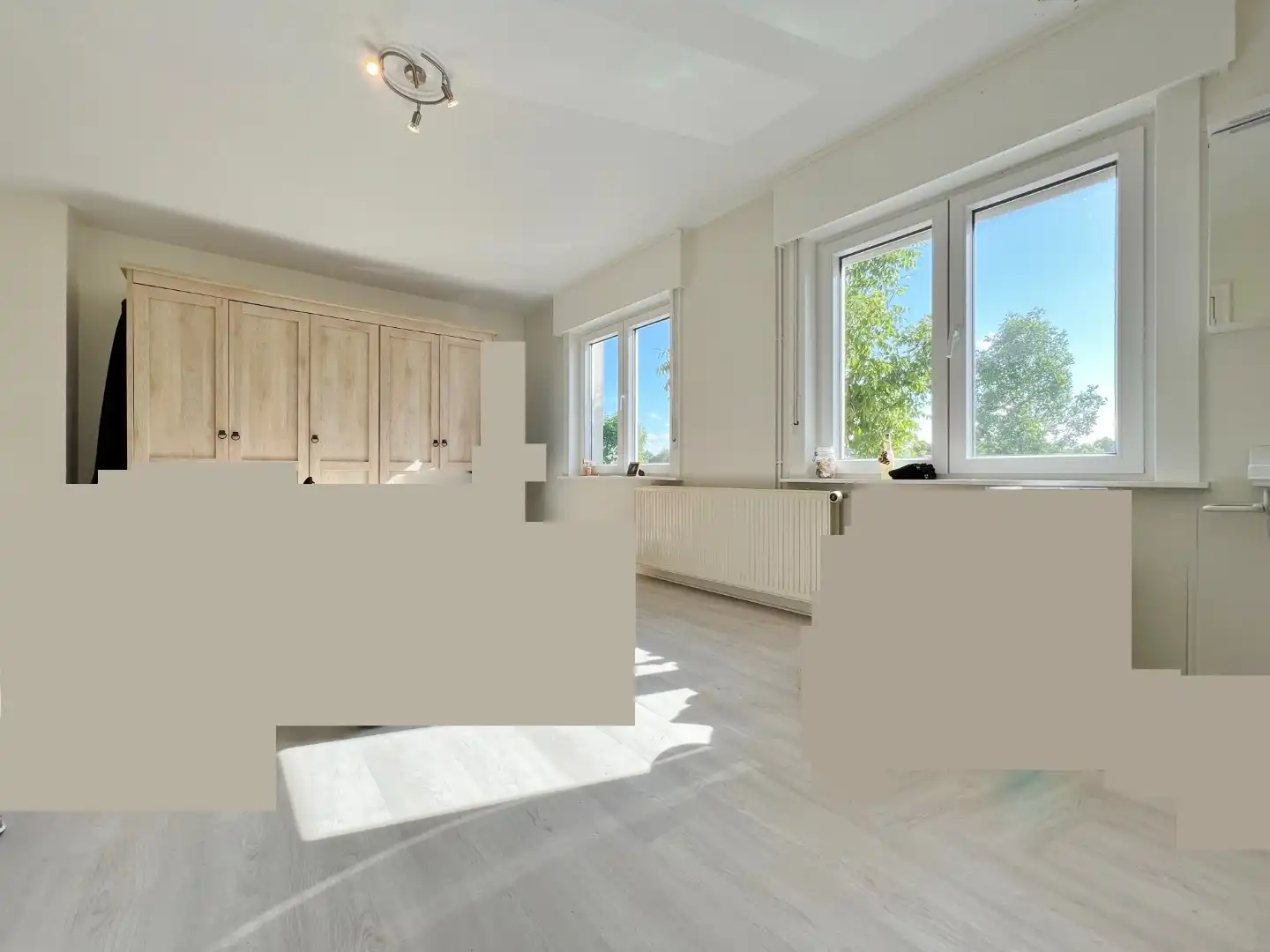 Centraal gelegen rijwoning met 4 slaapkamers en tuin.  foto 7