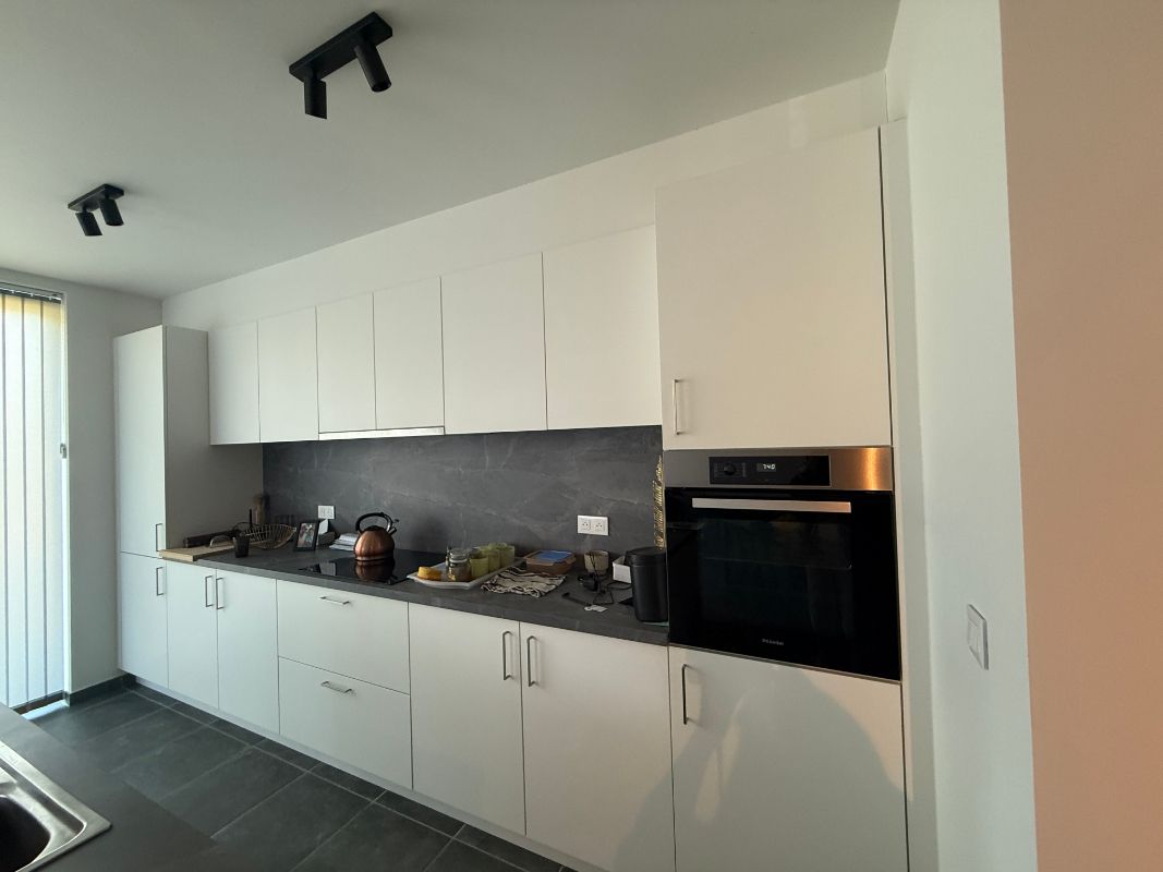 Gelijkvloers nieuwbouwappartement met terras en gezellig tuintje. foto 6