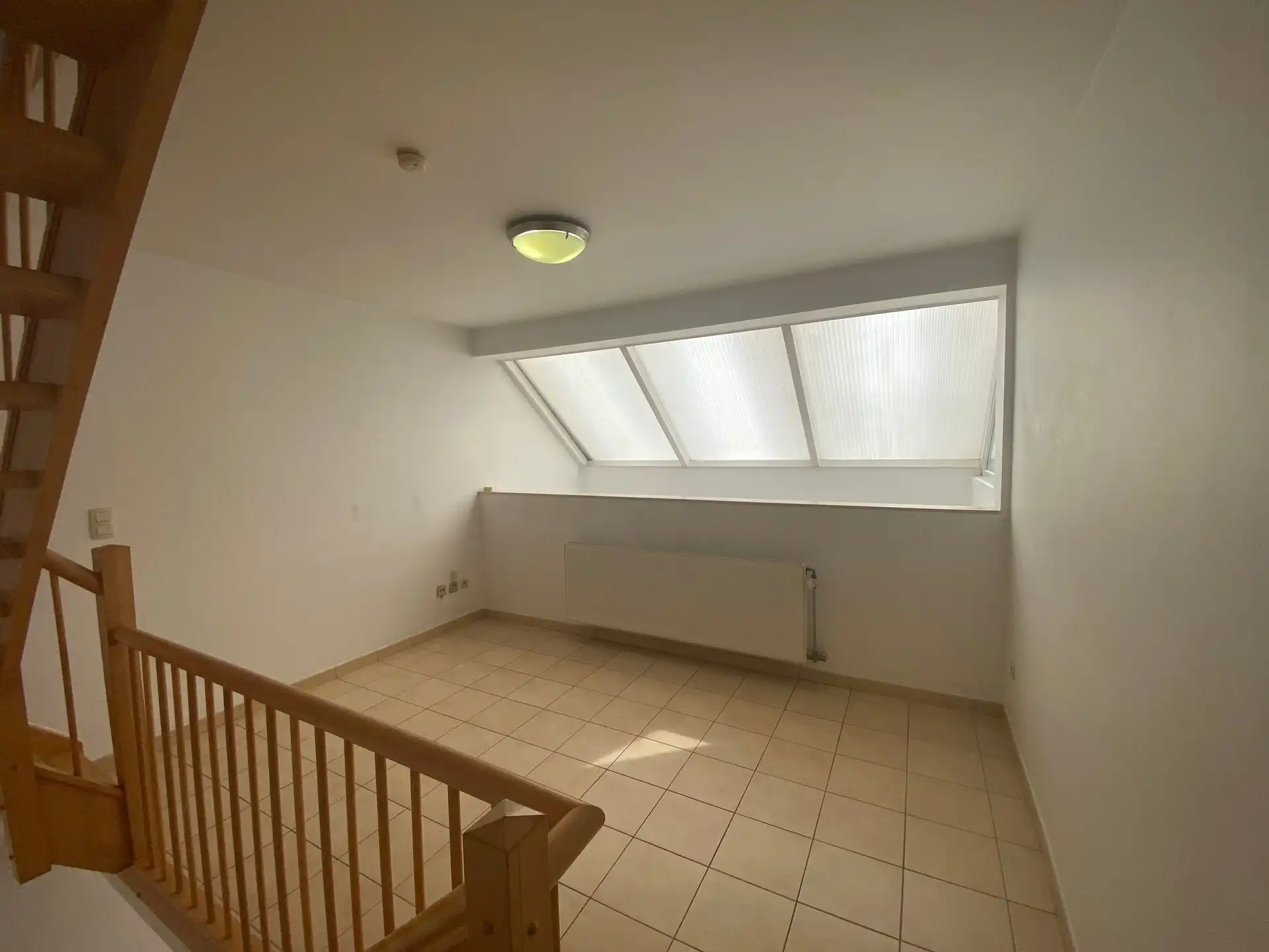 Ruime en lichtrijke woning met aangename west-geörienteerde tuin, gelegen in een rustige en doodlopende straat op wandelafstand van het centrum van Kortenberg. foto 8