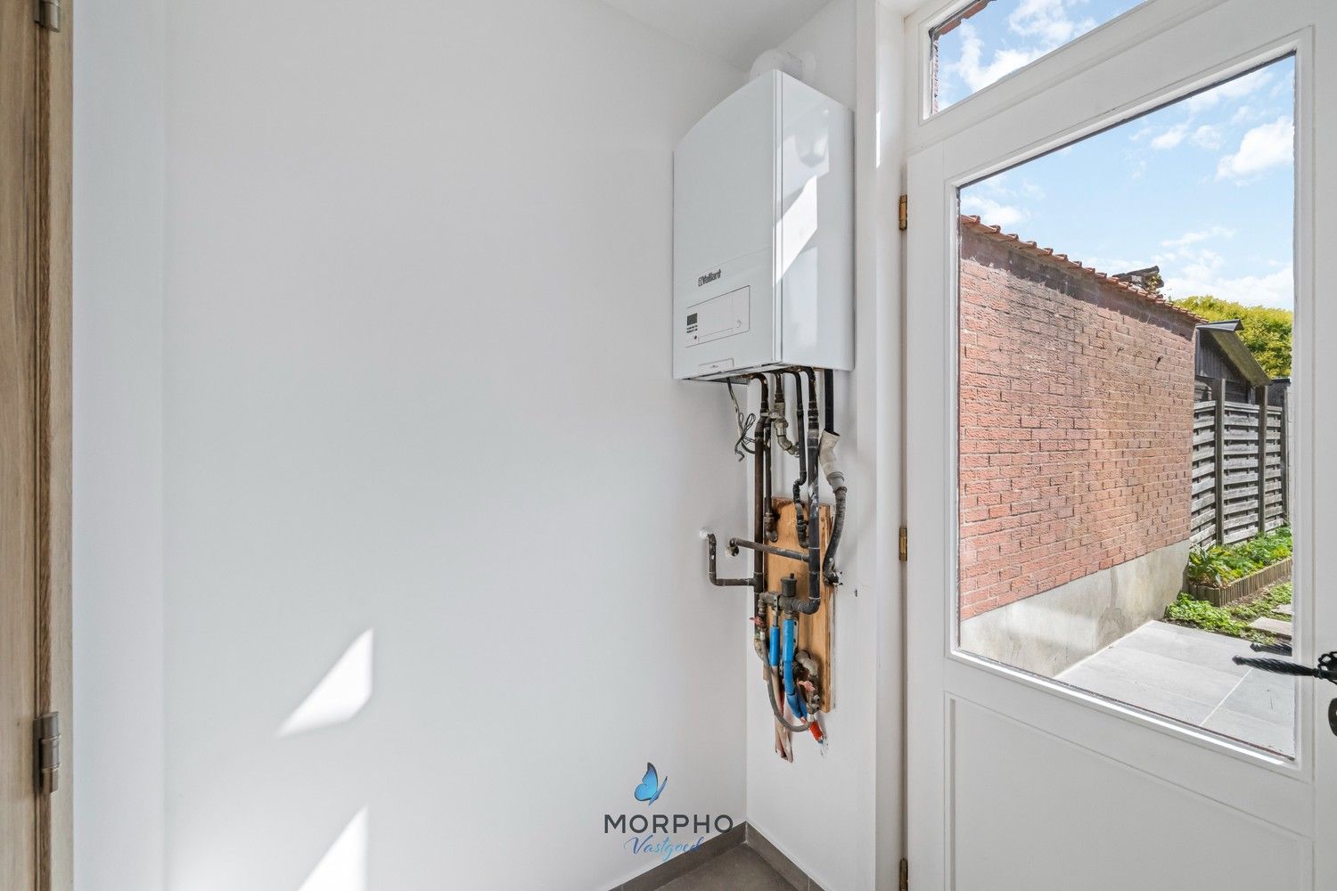 Recent gerenoveerde woning (2025) te koop met tuin in de geliefde Sint-Gilliswijk, Brugge foto 12