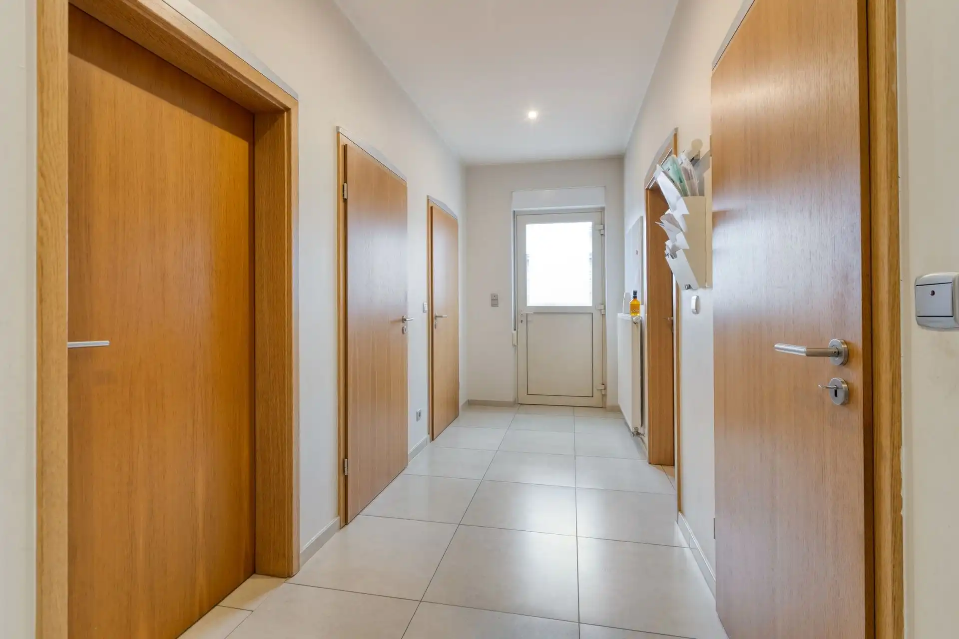 Ruime woning met maar liefst 4 slaapkamers én praktijkruimte in Maasmechelen! foto 11