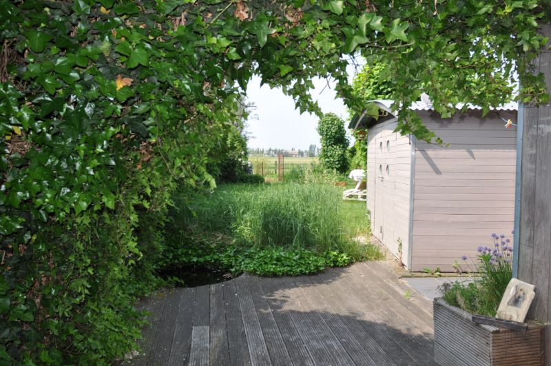 Charmante woning met 2 slaapkamers en ruime tuin. foto 7