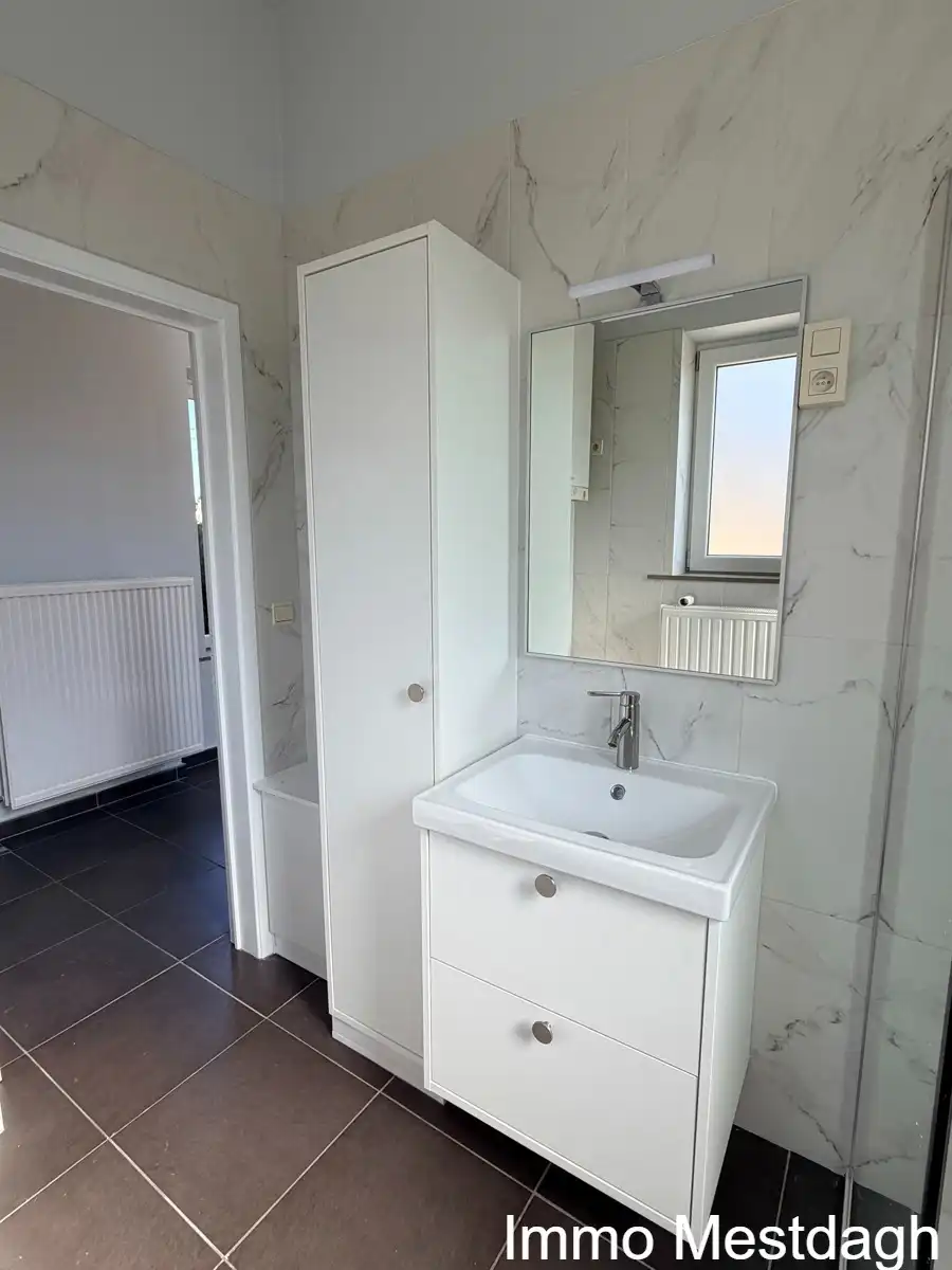 Prachtig gerenoveerd gelijkvloers appartement met terras en tuin in centrum Rummen foto 14