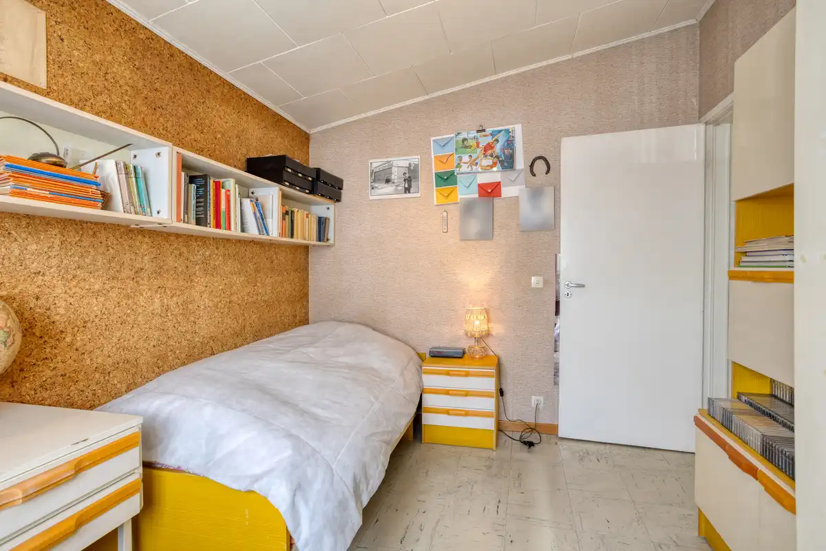 Te verfraaien woning - ruime tuin en garage foto 26