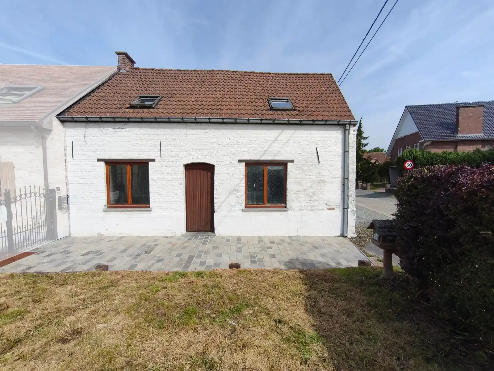 Rustig gelegen halfopen woning met tuin in Meerbeke foto 3