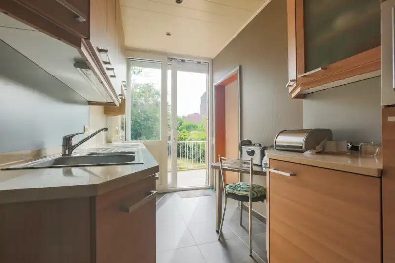 Te moderiseren woning met tuin garage en 3 slaapkamers (meer mogelijk). Sint-Elisabethwijk! foto 8