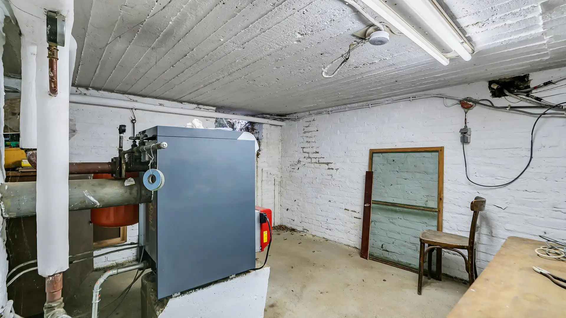 Op te frissen woning met 3 slpkrs te Maasmechelen foto 25