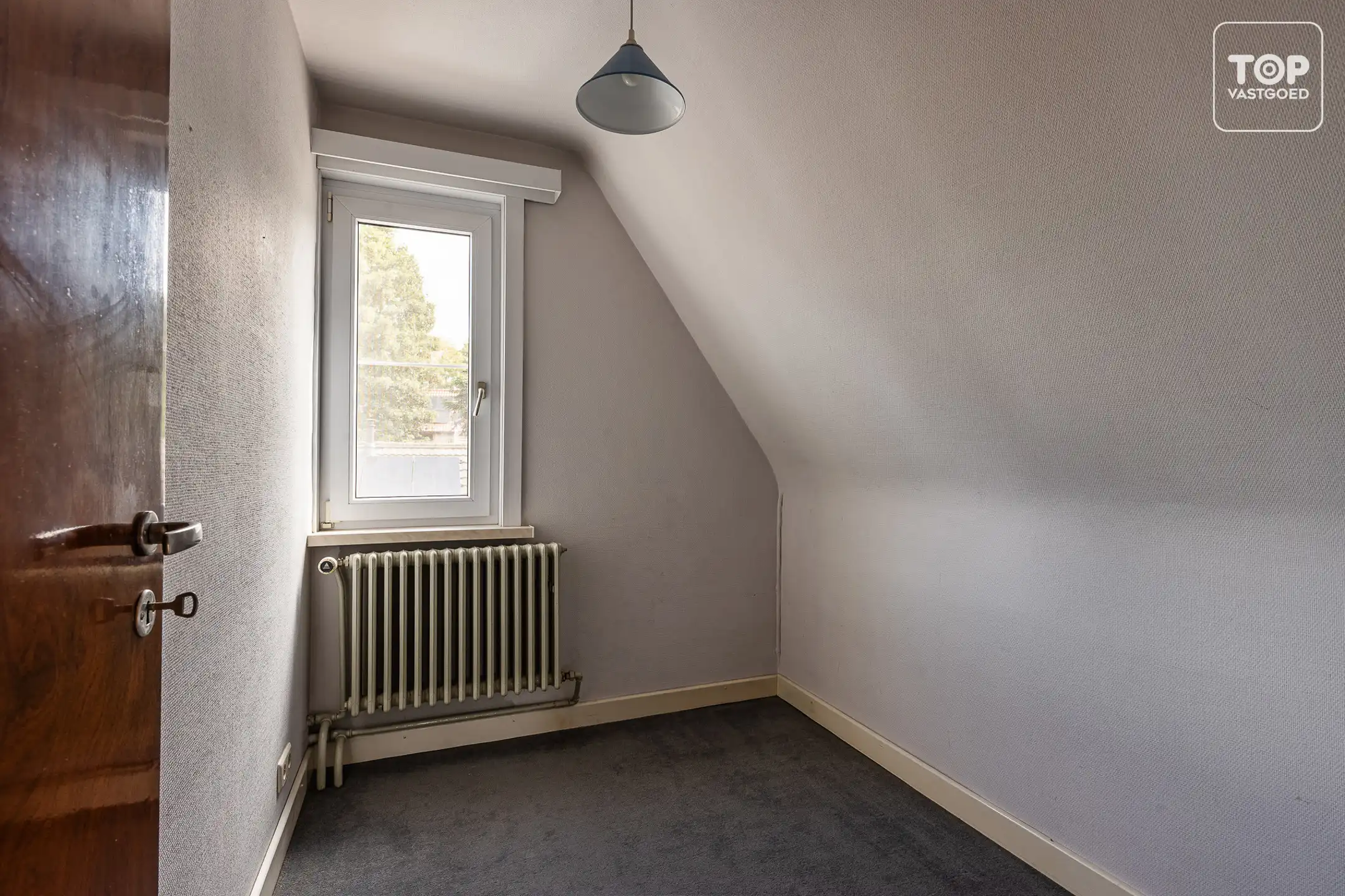 Te renoveren halfopen bebouwing met 3 slaapkamers, garage en ruime tuin op perceel van +-600 m² foto 16