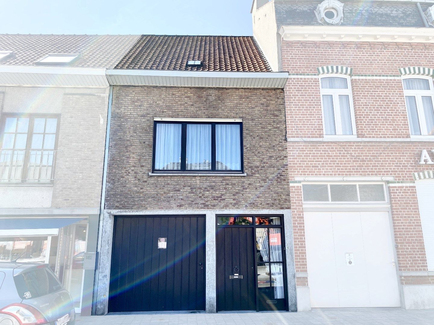 Kloeke woning met zonnige tuin pal in het centrum van Kuurne te koop foto 2