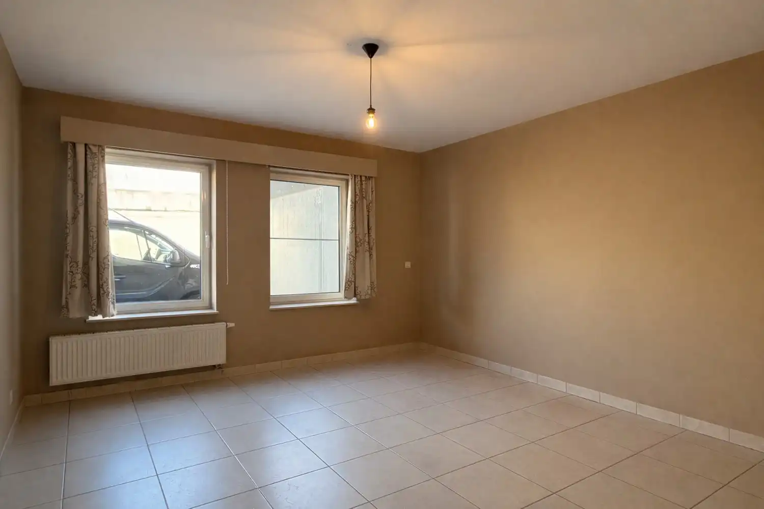 Instapklaar en energiezuinig ruim twee slaapkamer appartement in het centrum van Eke foto 7