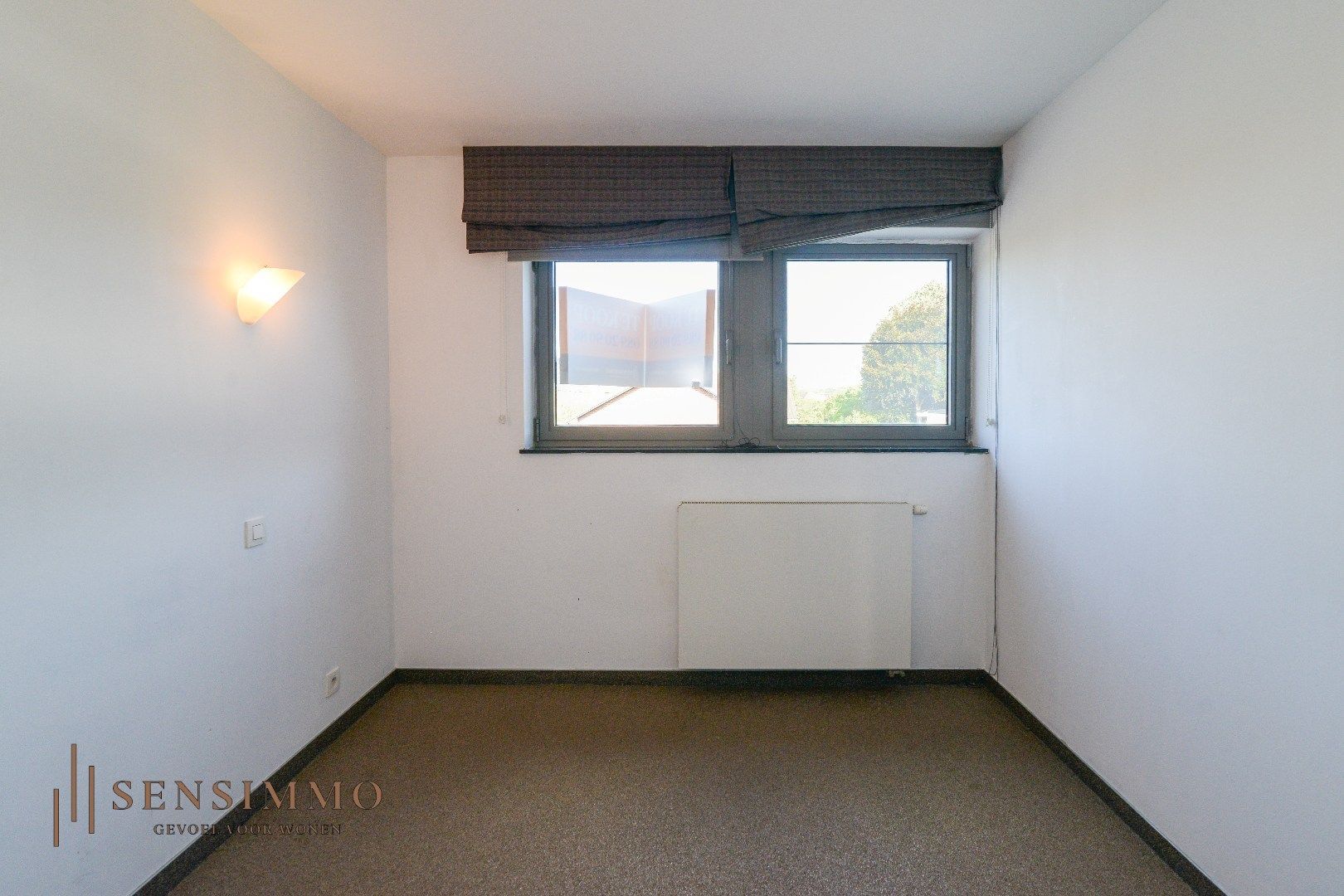 Ruim en instapklaar duplex appartement met carport en terras foto 10