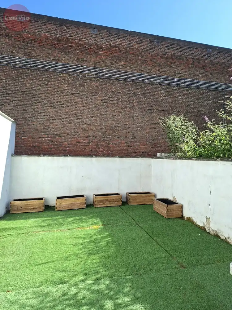Instapklaar 1-slaapkamerappartement met tuin in het stadscentrum foto 8