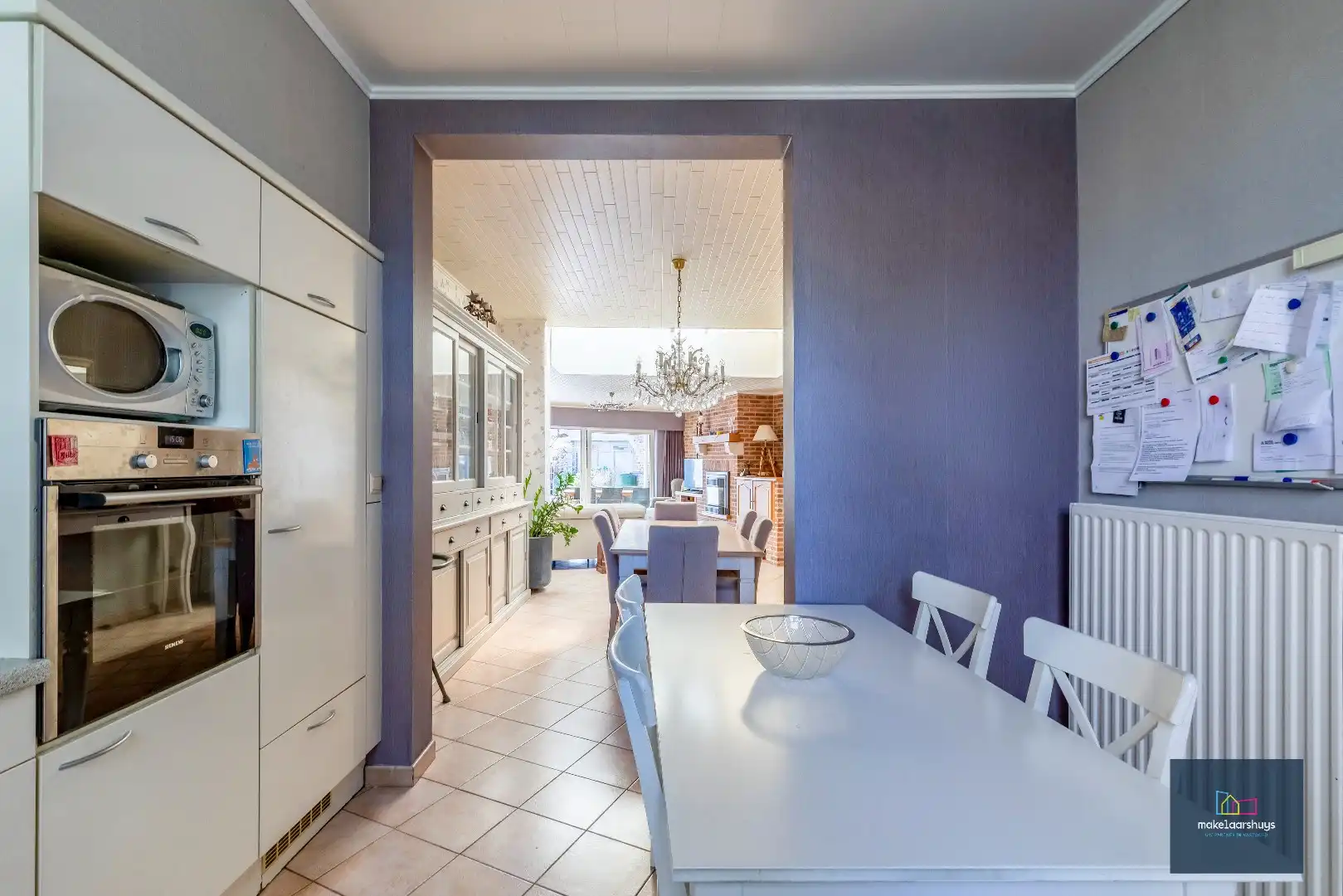 Goed onderhouden en ruime woning in rij met tuin/terras te Wondelgem foto 8