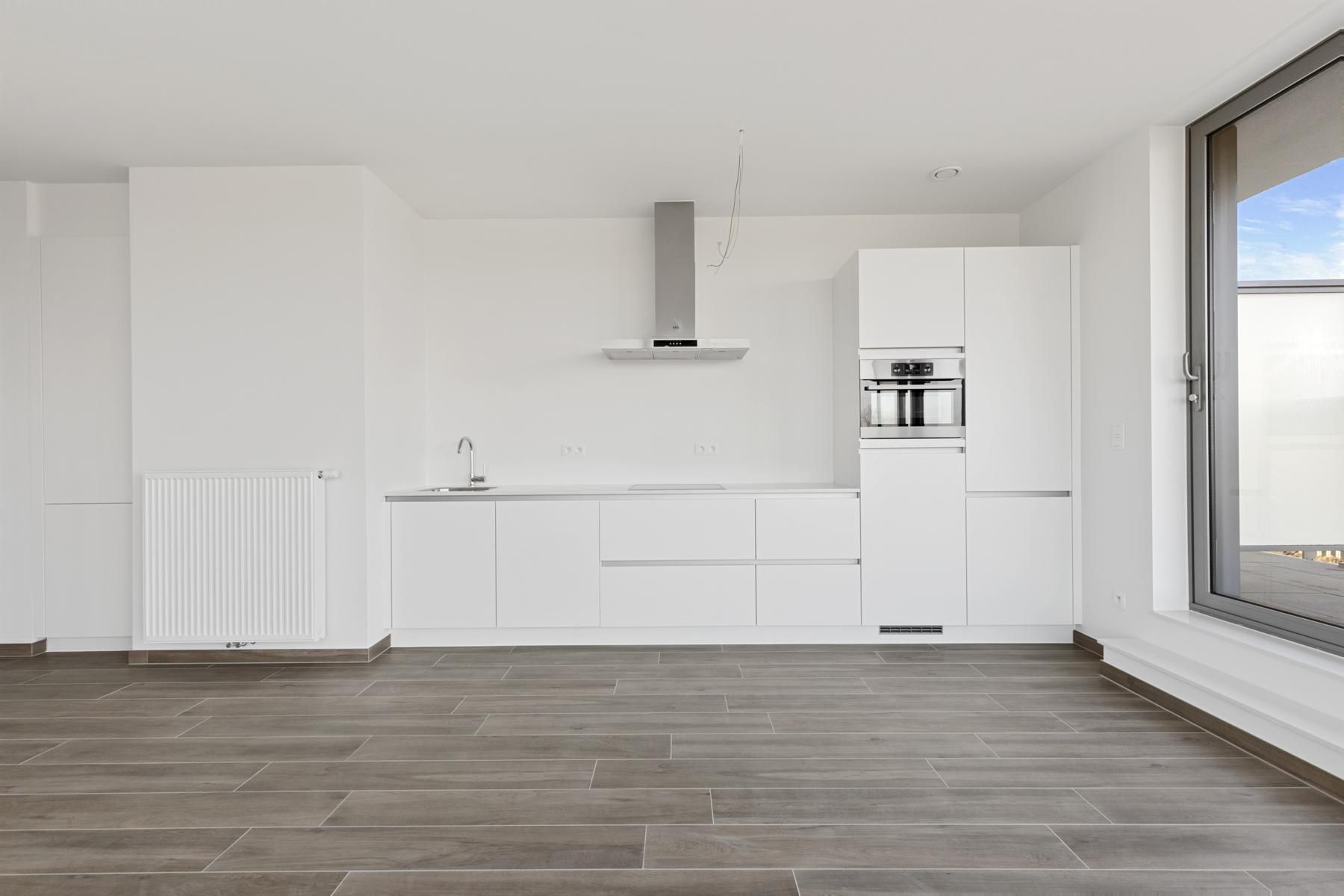 Penthouse met 1slpk en riant terras en ond. berging foto 3
