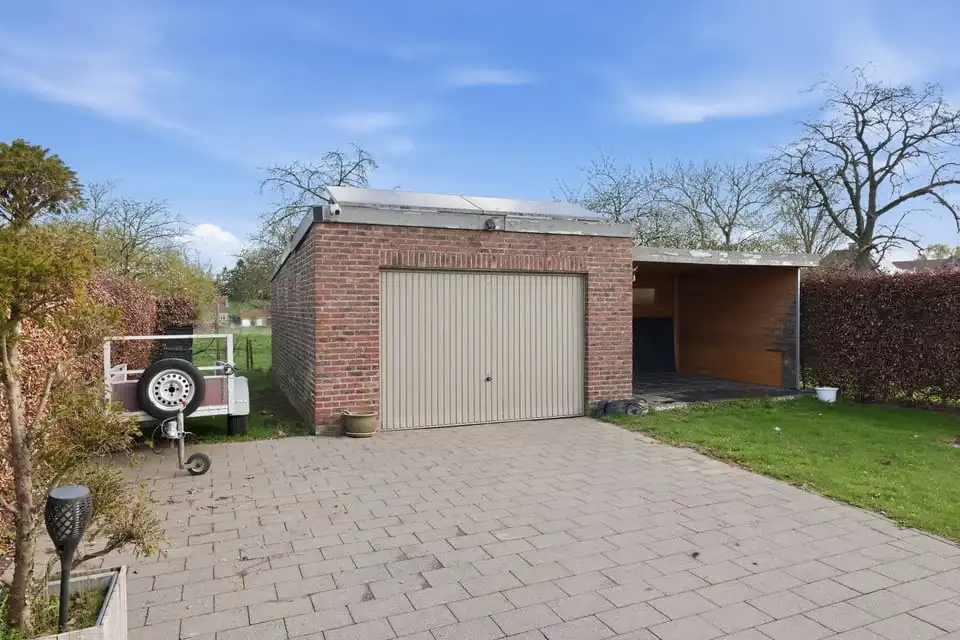 Instapklare gezinswoning met 3 slaapkamers en ruime tuin en garage in Tongeren foto 6