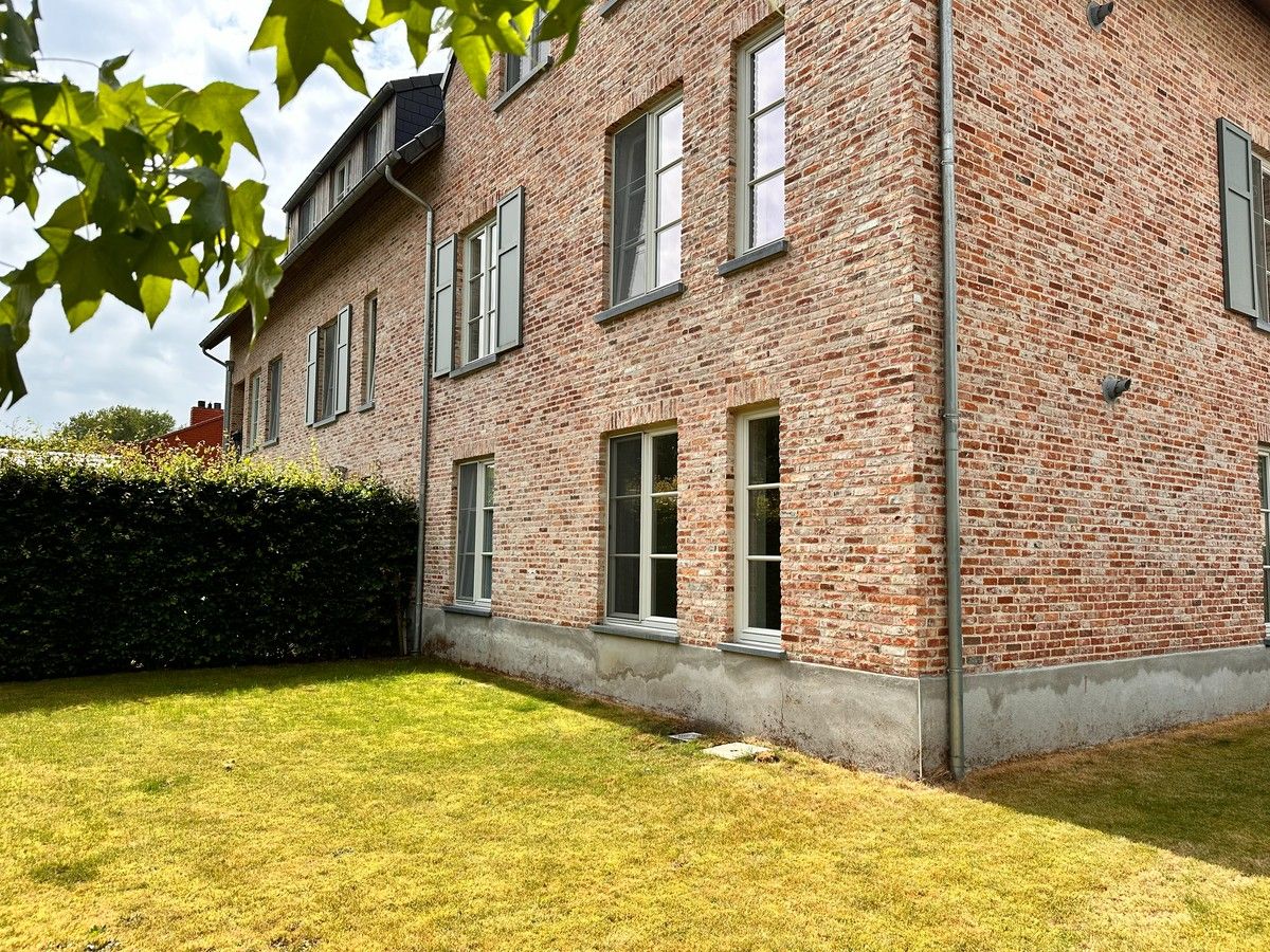 Mooi gelijkvloersappartement met 2 slpk en parking foto 11