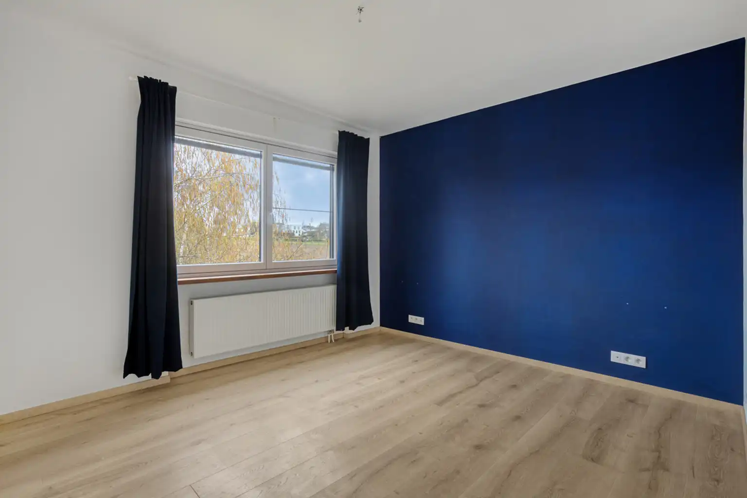 Volledig gerenoveerde driegevel bel-etage in rustige wijjk foto 9