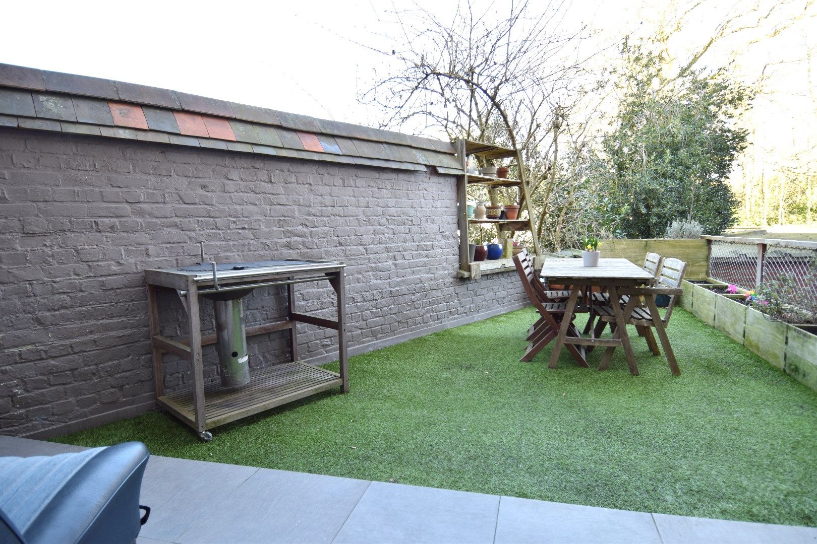 Karaktervolle burgerwoning met 2 slaapkamers, garage/werkplaats en zonneterras in hartje Kortrijk te koop foto 23
