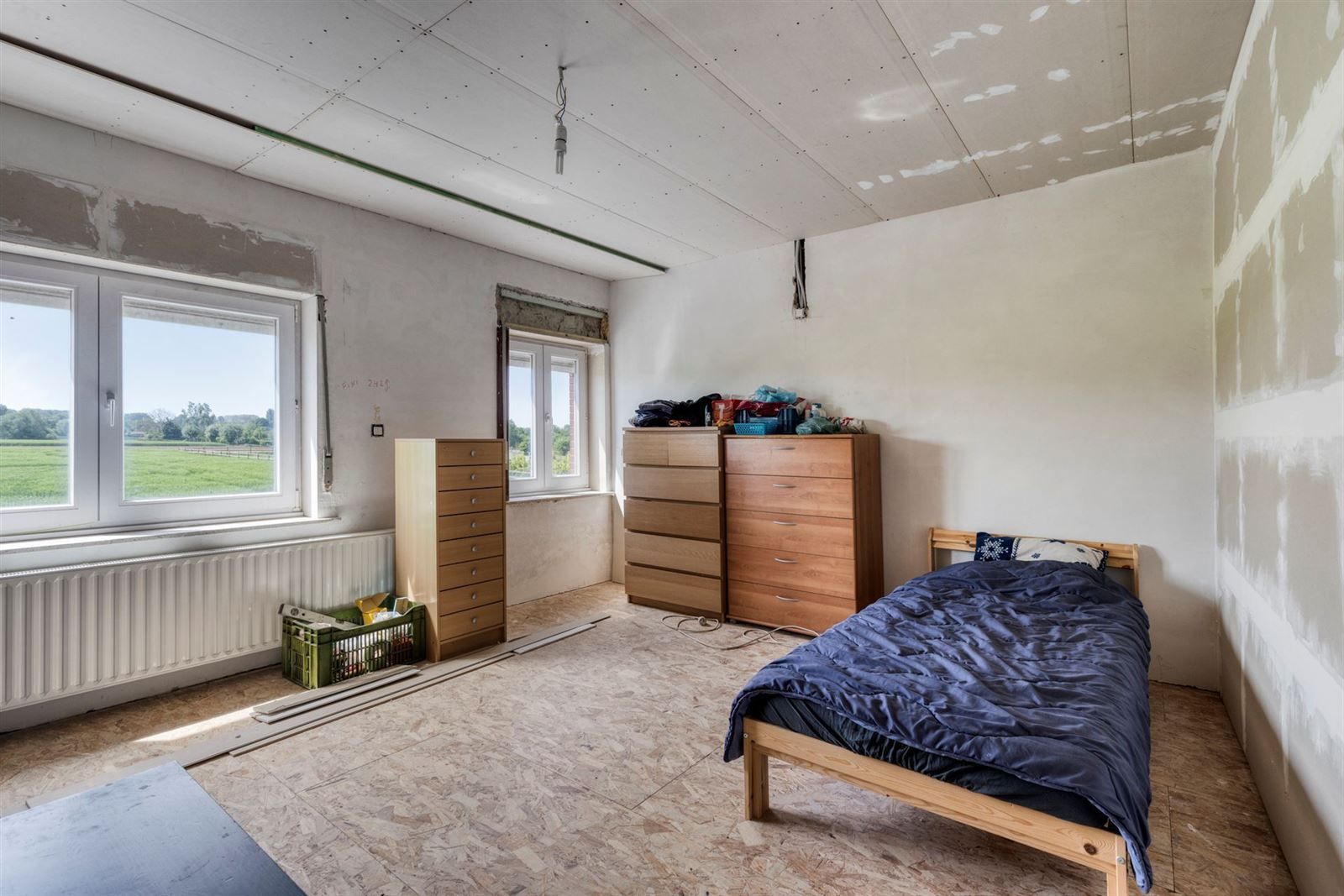 Verder te renoveren woning met grote tuin!  foto 12