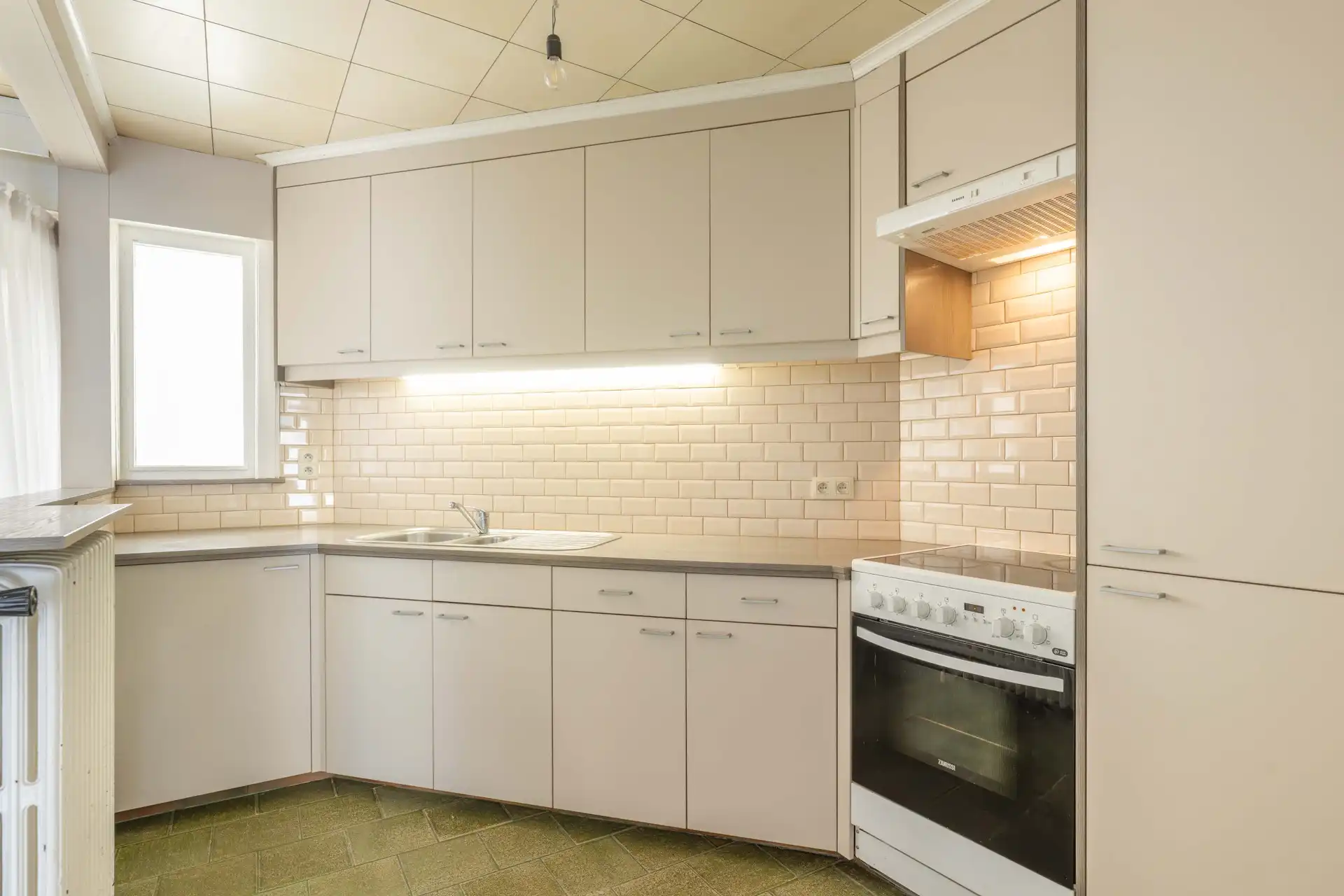 Gezellige woning met drie ruime slaapkamers en veel bergruimte te koop in Wakken foto 6