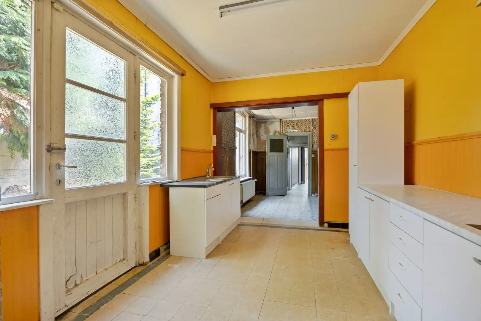 Ruime te renoveren woning met 3 slaapkamers in Lubbeek met doorgang langs het perceel van de buren. EPC: 736 KWH/m² foto 12