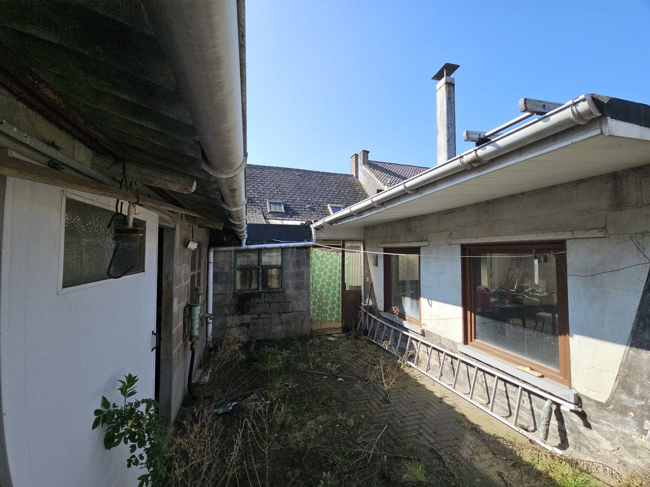 Ruime, grondig te renoveren woningn op 7a foto 5