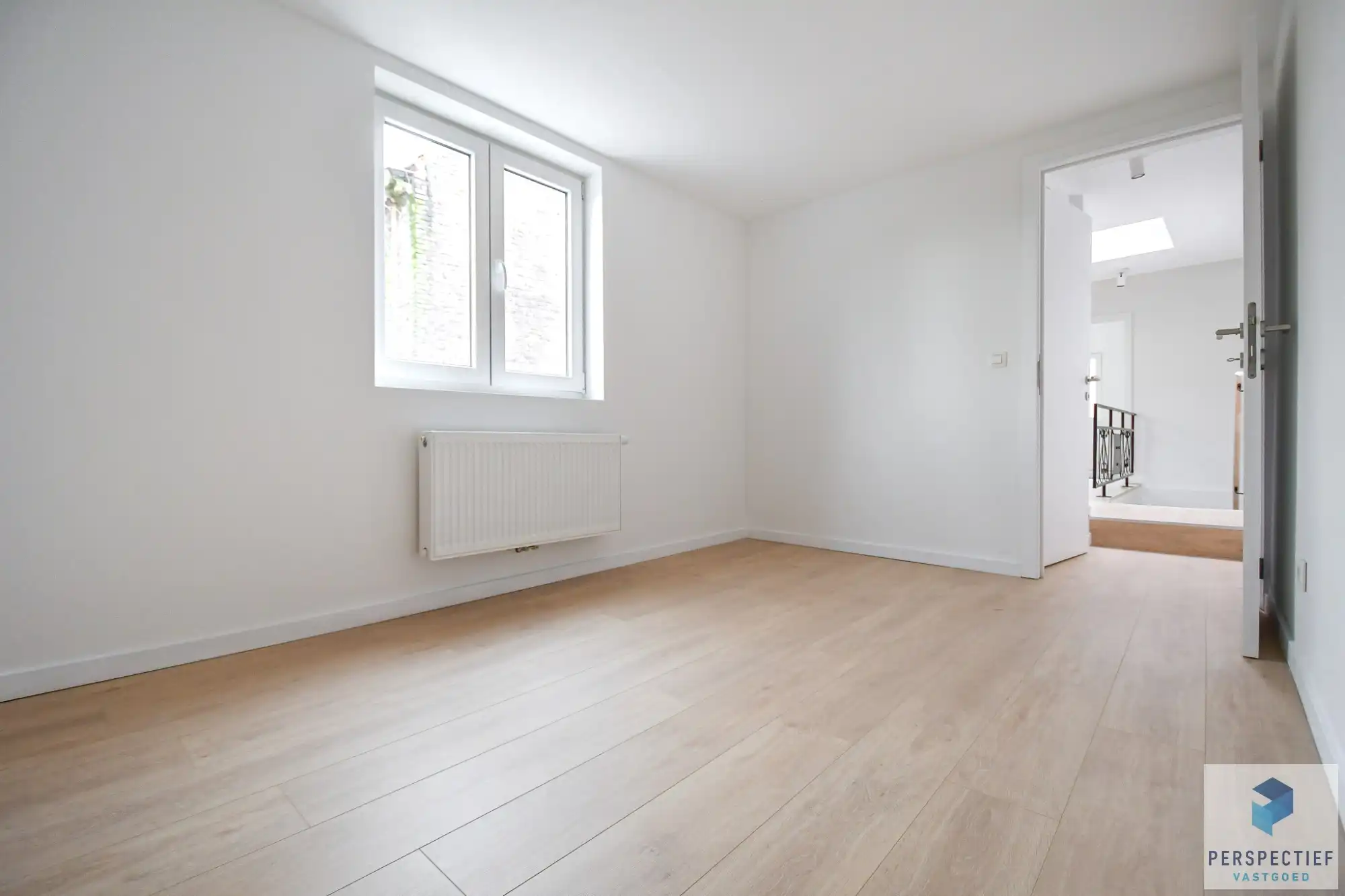 Vernieuwde woning met 3 slaapkamers en ZONGERICHTE tuin met uitweg en GROTE GARAGE foto 15