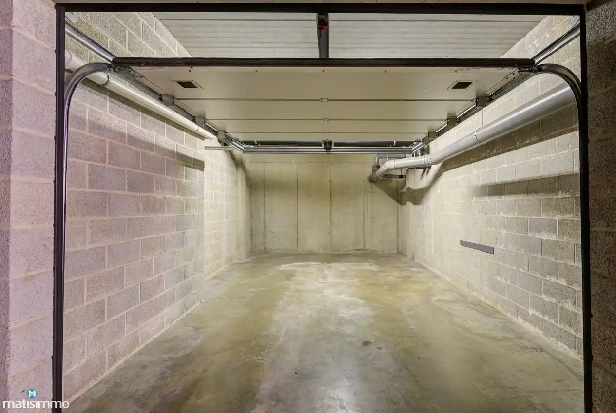 ZEER RUIM EN MODERN DUPLEXAPPARTEMENT (234M²) MET 5 SLAAPKAMERS, 2 BADKAMERS, 2 TERRASSEN, 2 KELDERS, DUBBELE GARAGE (60M²) (+ OPTIONEEL GARAGE) IN HET CENTRUM VAN LANAKEN foto 40