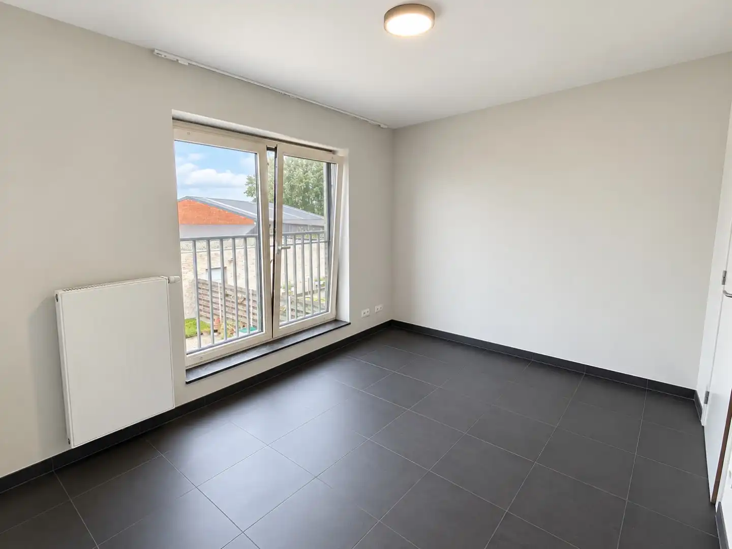Energiezuinig appartement met twee slaapkamers te huur in Evergem foto 9
