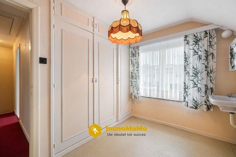 Te renoveren woonst in een rustige wijk te koop in Moerbeke foto 18