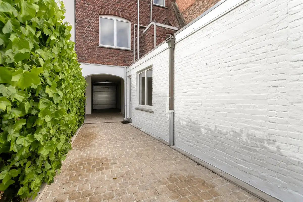 Bel-etage met 2 slaapkamers te koop op de Dam te Kortrijk! foto 15