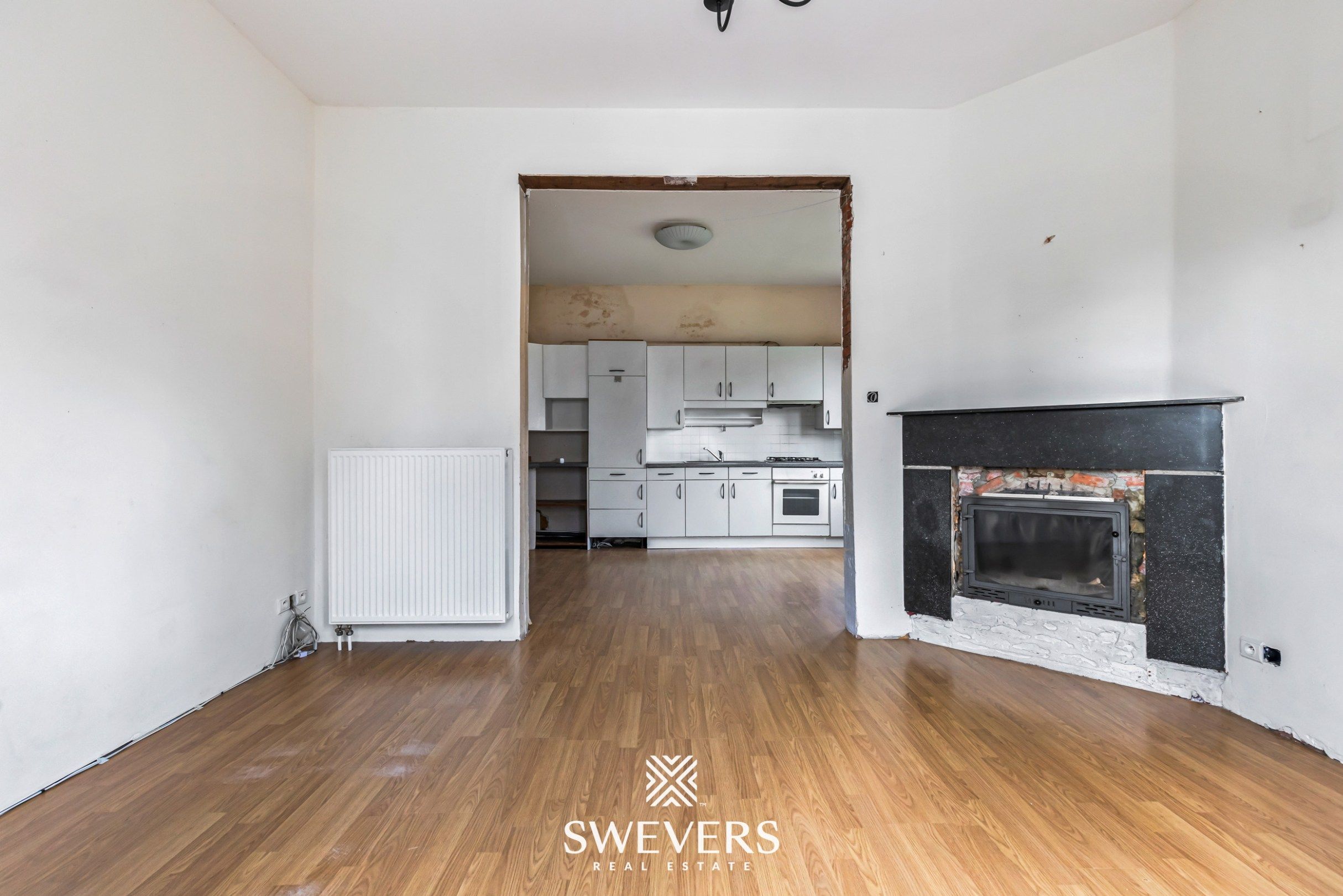 Unieke renovatiekans: karaktervol herenhuis te Zonhoven foto 4