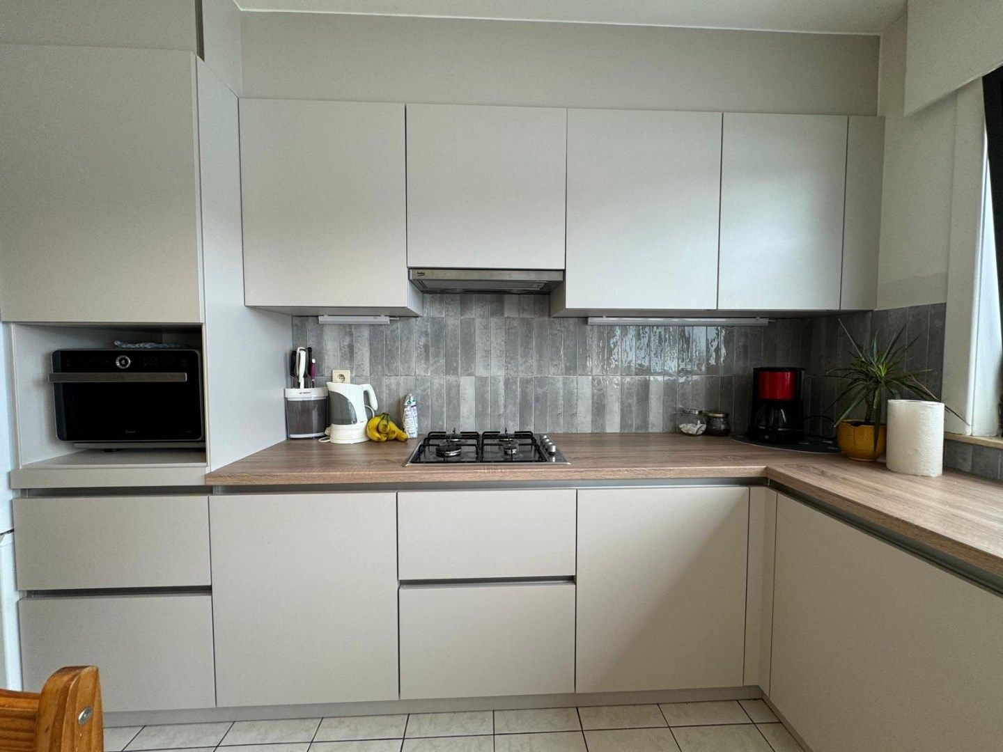 Op zoek naar een opbrengsteigendom met handelspand, 2 appartementen en 4 garages in hartje Merchtem? Welkom Home!  foto 12