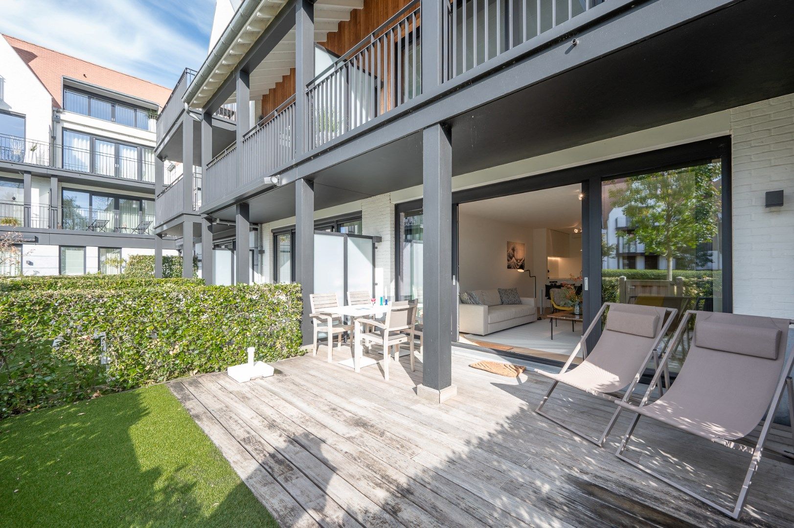 Recent en zonnig tuinappartement aan meer Duinenwater foto 6