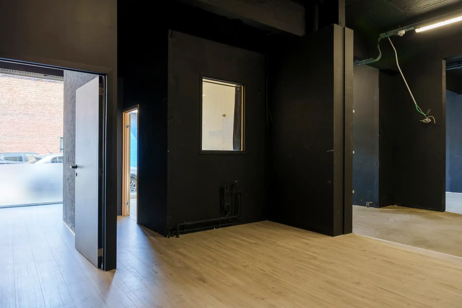 Veelzijdige commerciële ruimte met uitzonderlijke hoogte foto 12