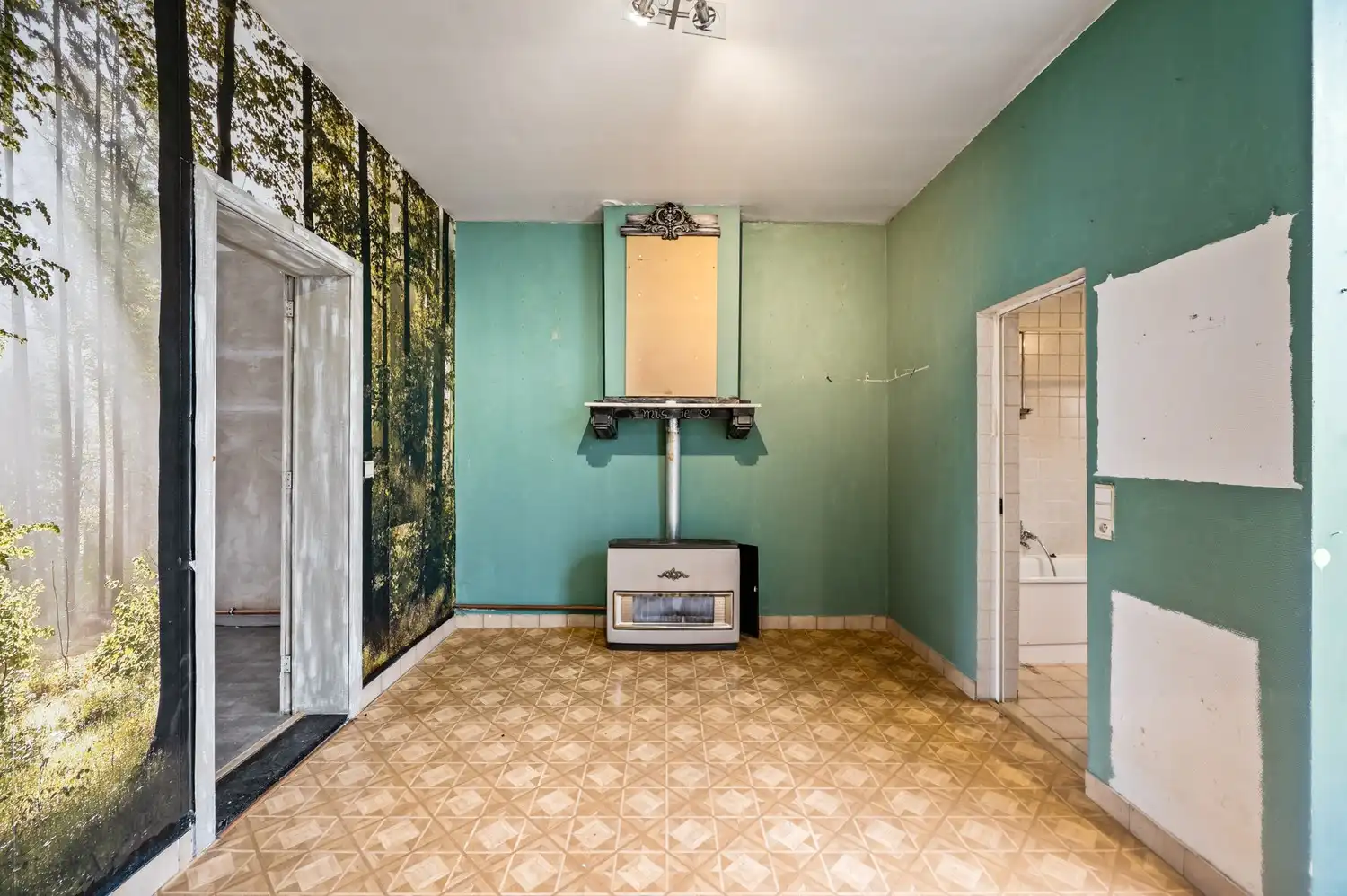 Te renoveren woning met tuin en garage in centrum Wijnegem! foto 5