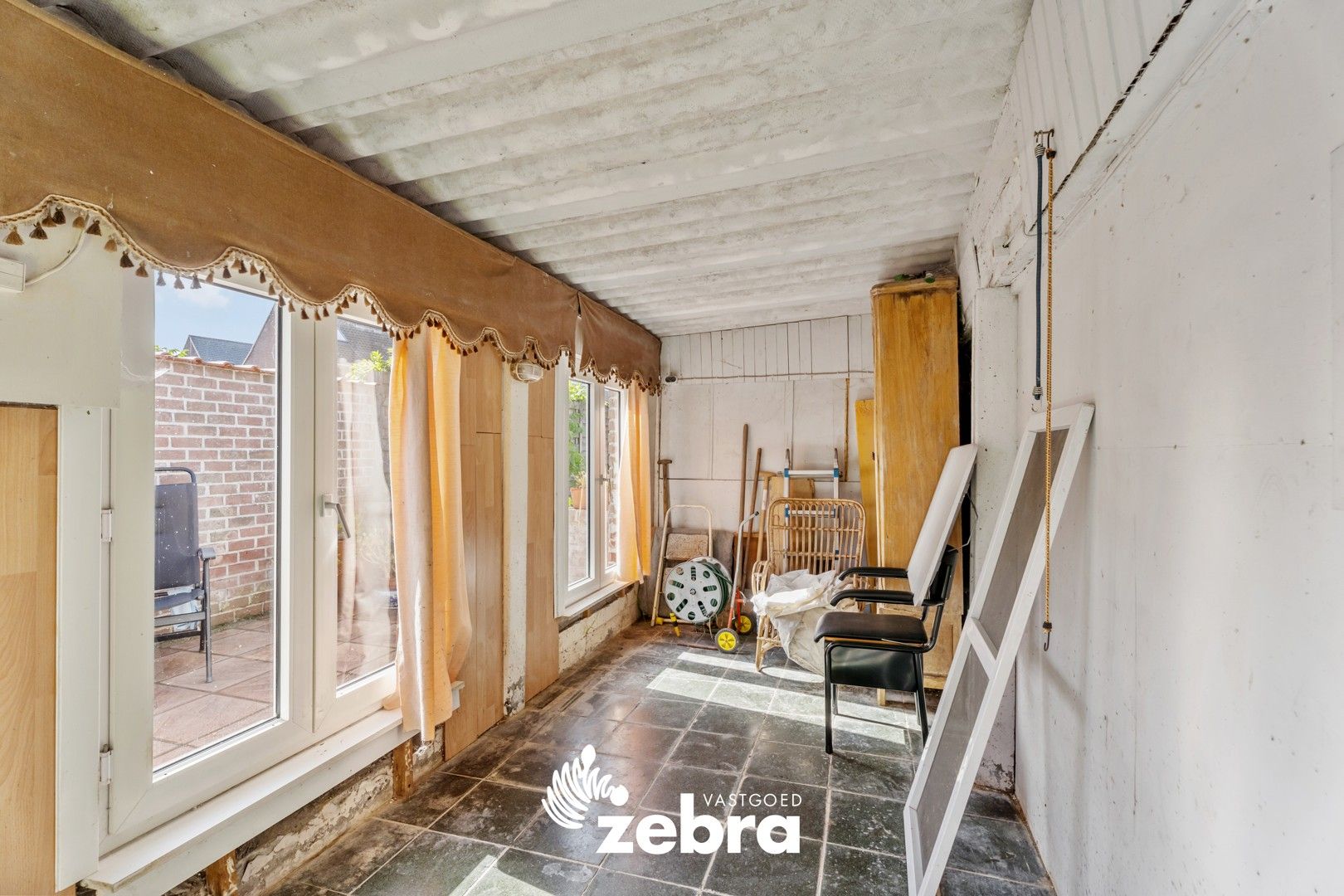Op te frissen woning met zuidwestgerichte tuin en uitweg op een centrale ligging te Tielt! foto 14